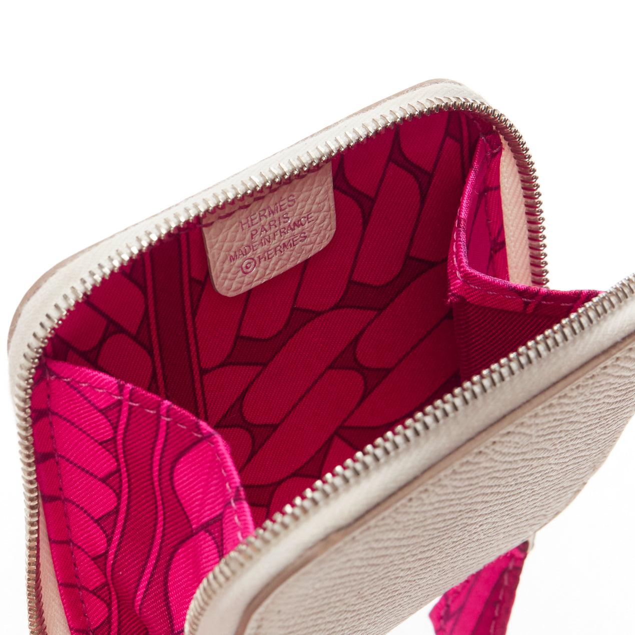 HERMES Azap Compact white leather pink printed silk zip around coins holder
Reference: AAWC/A00993
Brand: Hermes
Model: Azap Compact
Material: Leather
Color: White, Pink
Pattern: Chain
Closure: Zip
Lining: Pink Silk
Extra Details: Chain printed hot