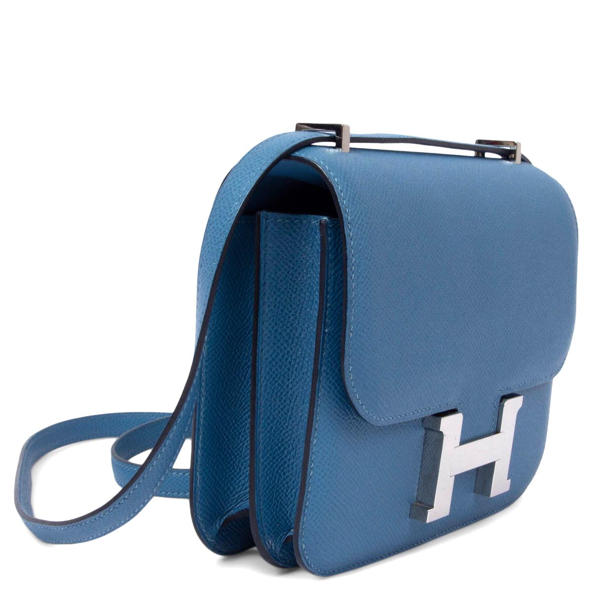 100% authentic Hermès Constance 18 mini shoulder bag in Bleu Azure Veau Epsom leather. Palladium H buckle closure. Lined with Veau Swift leather. The interior is divided into two compartments, with an open pocket on the front and back. Has been worn