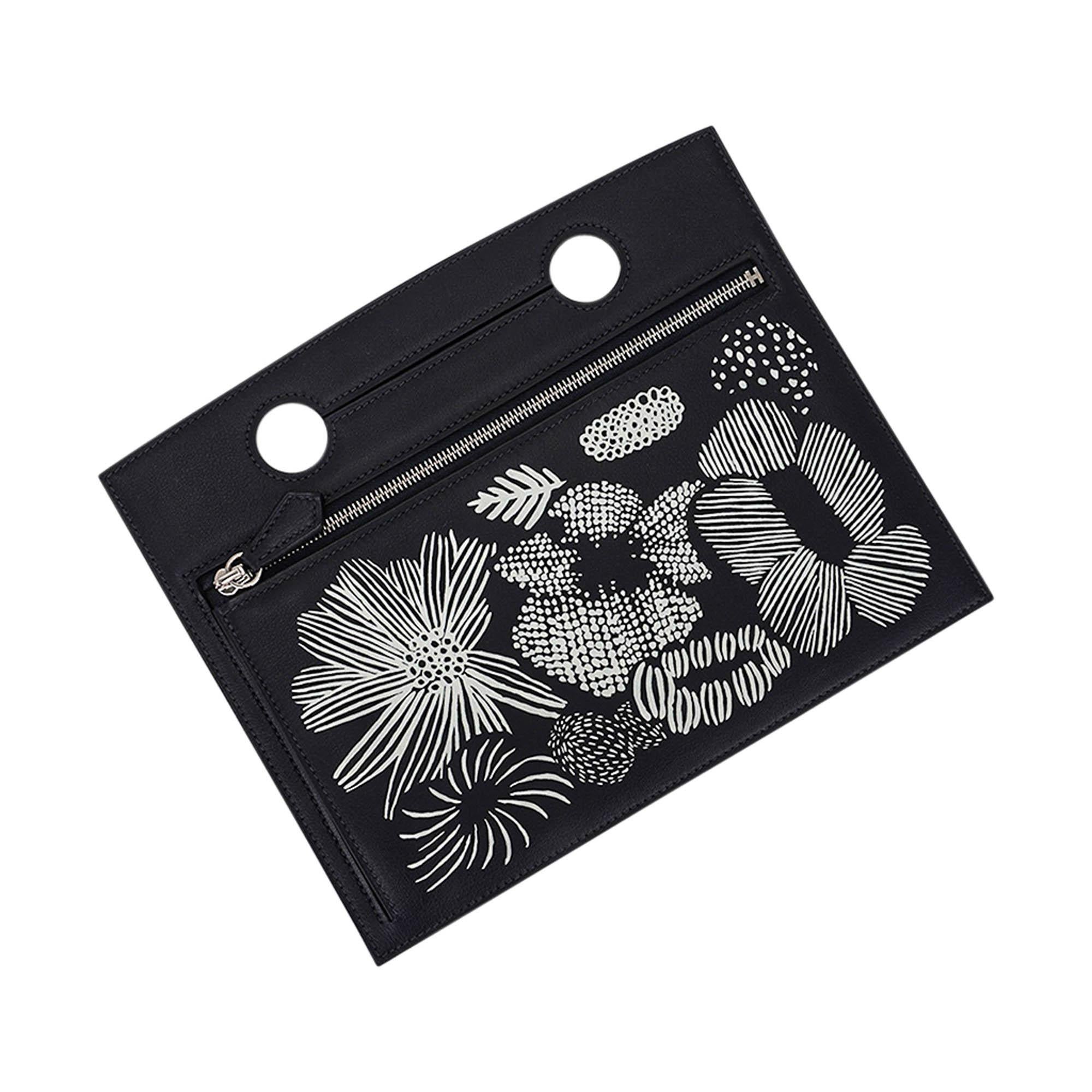 Mightychic offers an Hermes Limited Edition Backpocket 30 Pouch featured in Caban.
Beautiful Black Floral design.
Fits 30 cm Birkin bag.
Beautiful in Swift leather with Palladium hardware.
This flat Hermes Backpocket fits easily over the handle and