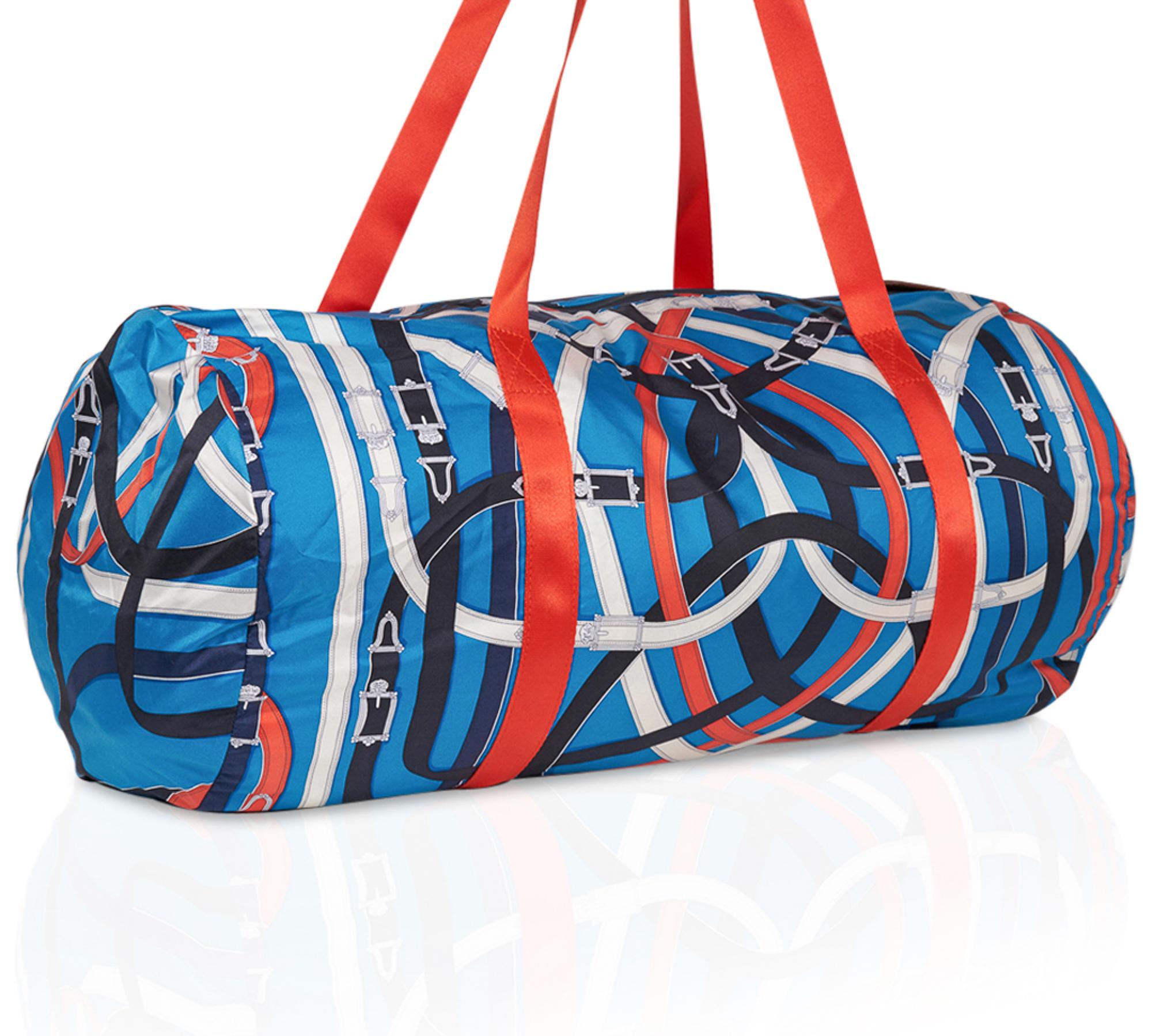 Guaranteed authentic limited edition Hermes Airsilk Duffle Cavalcadour 44 bag featured in Blue, Orange, White and Black.
Beautiful Cavalcadour silk scarf print designed by Henri d'Origny.
The perfect elegant top zip weekend / gym bag. 
Palladium