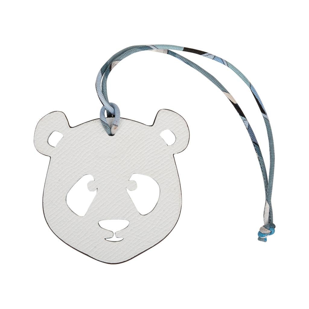 Coveted Hermes Petit h Bi-Color Panda bag charm with silk twill cord.
This whimsical charm comes in White in Epsom and Blue in Togo.
This iconic Hermes accessory can be worn in a myriad of ways to add a playful touch to your wardrobe.
And of course