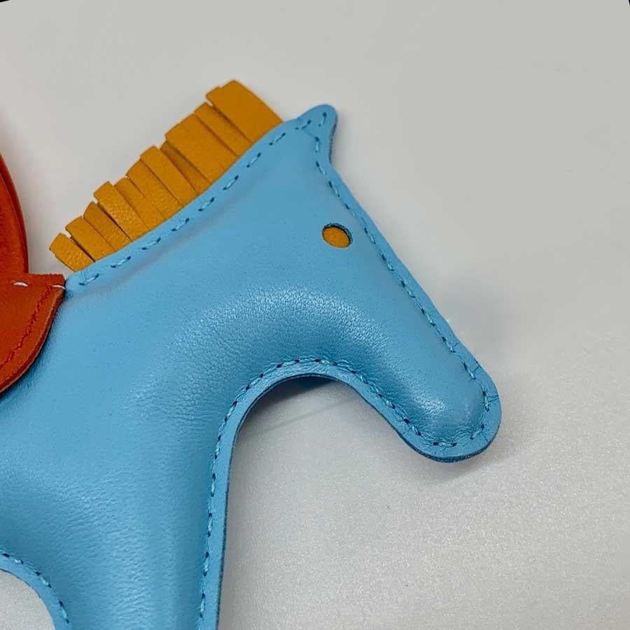 Blue Hermès bag charm 