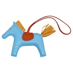 Hermès bag charm "Rodéo" in Celeste blue lambskin