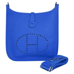 Sac Hermès Evelyne GM bleu Hydra Clemence finitions métalliques en palladium, neuf avec boîte