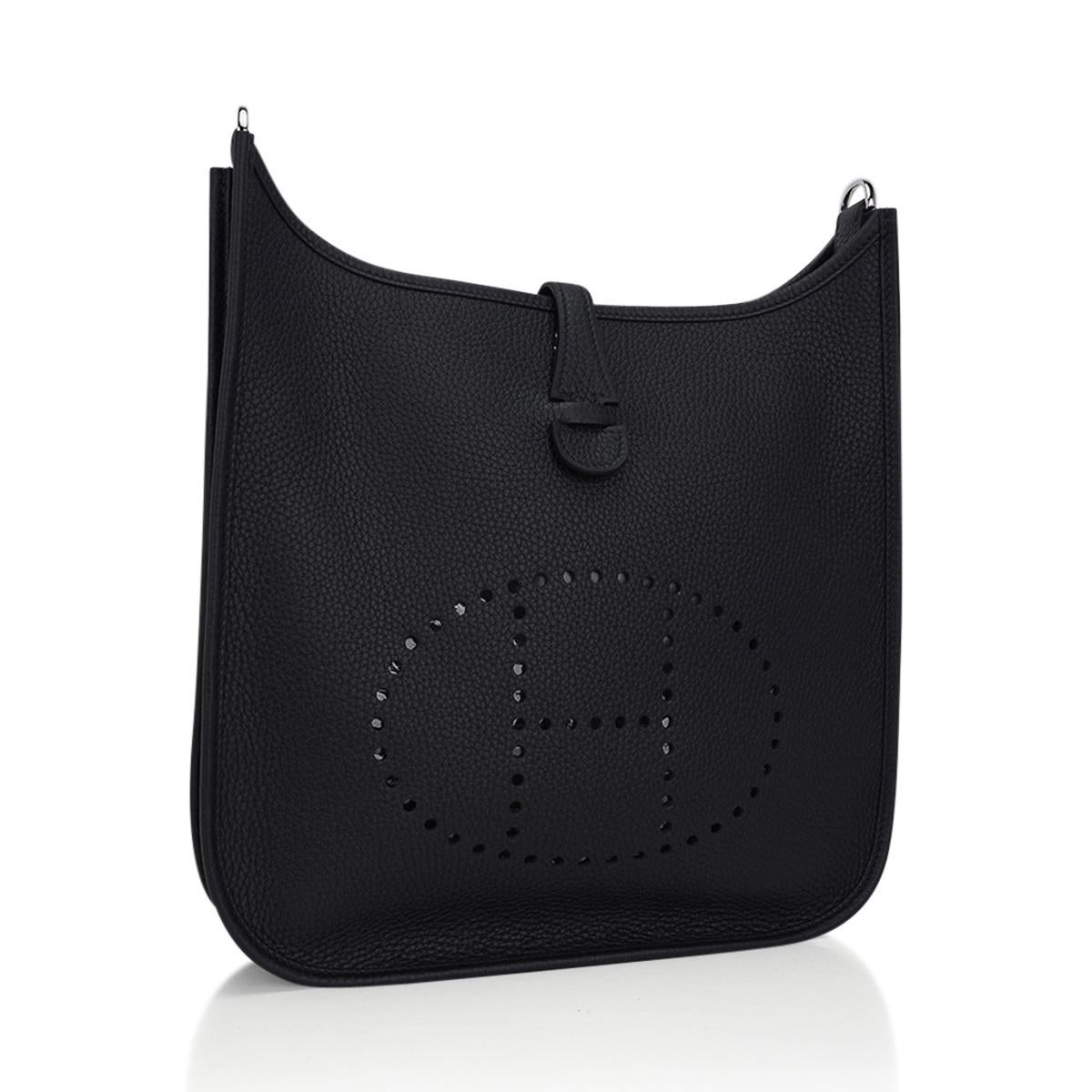 Mightychic offers an Hermes Evelyne PM bag featured in classic Black.  
Fresh with Clemence leather and Palladium hardware.
Fabulous shoulder or cross body bag with roomy interior and rear outside deep pocket. 
Sport strap in textile with leather