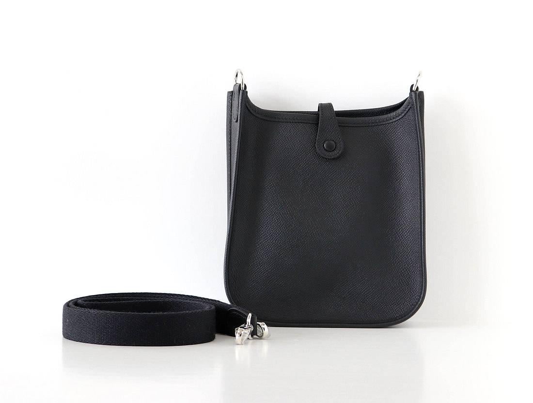 Guaranteed authentic coveted Hermes Evelyne TPM Mini Black Epsom Supple.
Fresh with Palladium hardware.
Fabulous shoulder or cross body bag.
Sport strap in black textile with leather and palladium hardware details.
Signature perforated H on front of