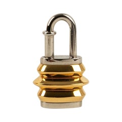 Hermès Bag Jewelry/Padlock in Golden Metal and Silvery Metal
