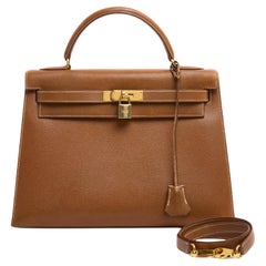 Sac Hermes Kelly 32 Sellier Cuir Or HDW Or 1997 avec bandoulière