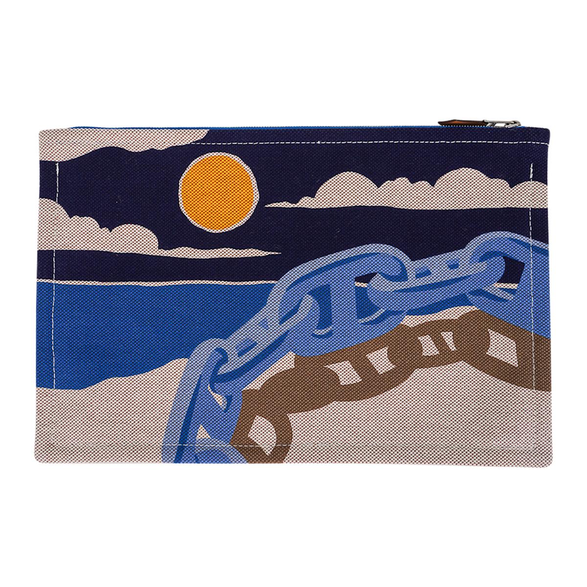 Mightychic offers an Hermes Escale a la Plage flat case featured in Ciel/Nuit.
Designed by Mathieu Cosse and inspired by the Chaine d'Ancre.
Depicted lying in the sand relfecting the chaging time of day.
Top zipper with embossed metal pull.
Created