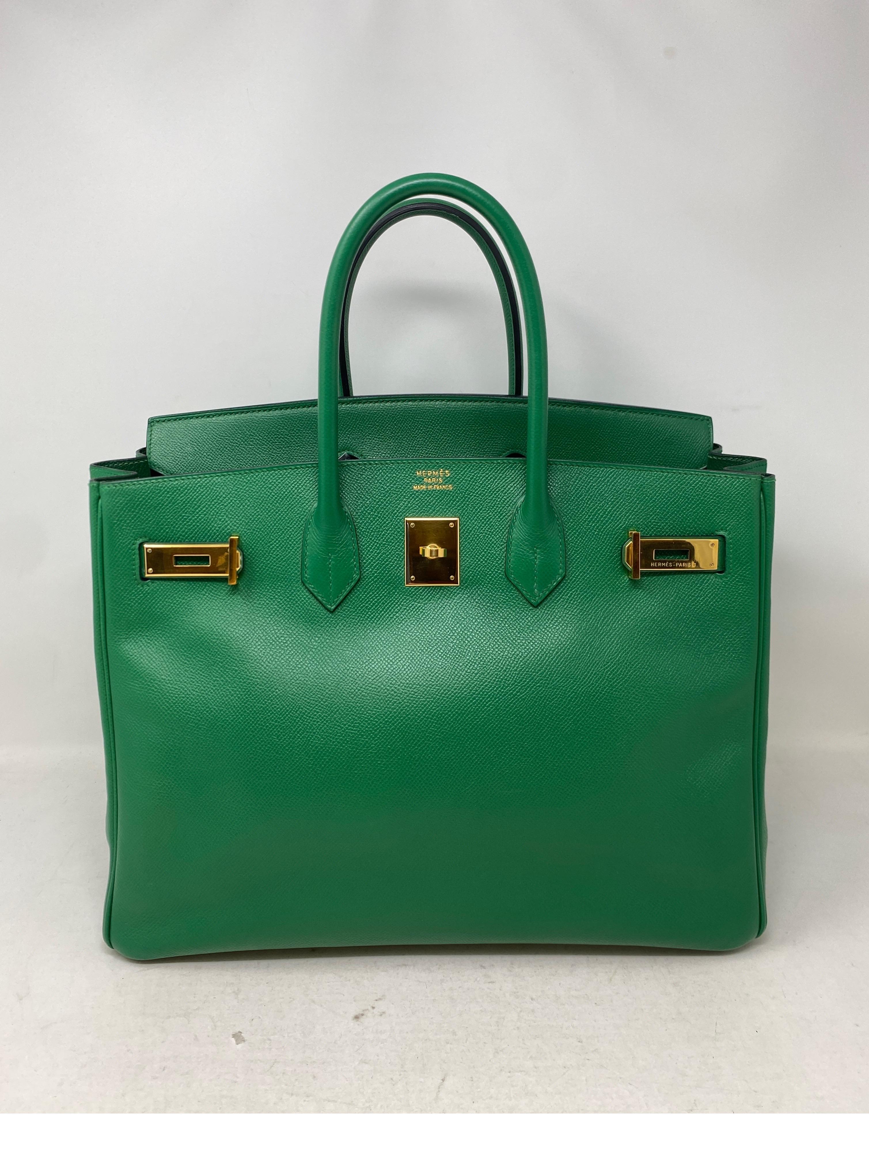 Hermes Vert green Birkin 35 Bag. Gold hardware. Vintage Birkin. Courchevel leather. Rare and gorgeous green color. Clean interior. Excellent condition. Includes clochette, lock, keys, and dust cover. Guaranteed authentic. 