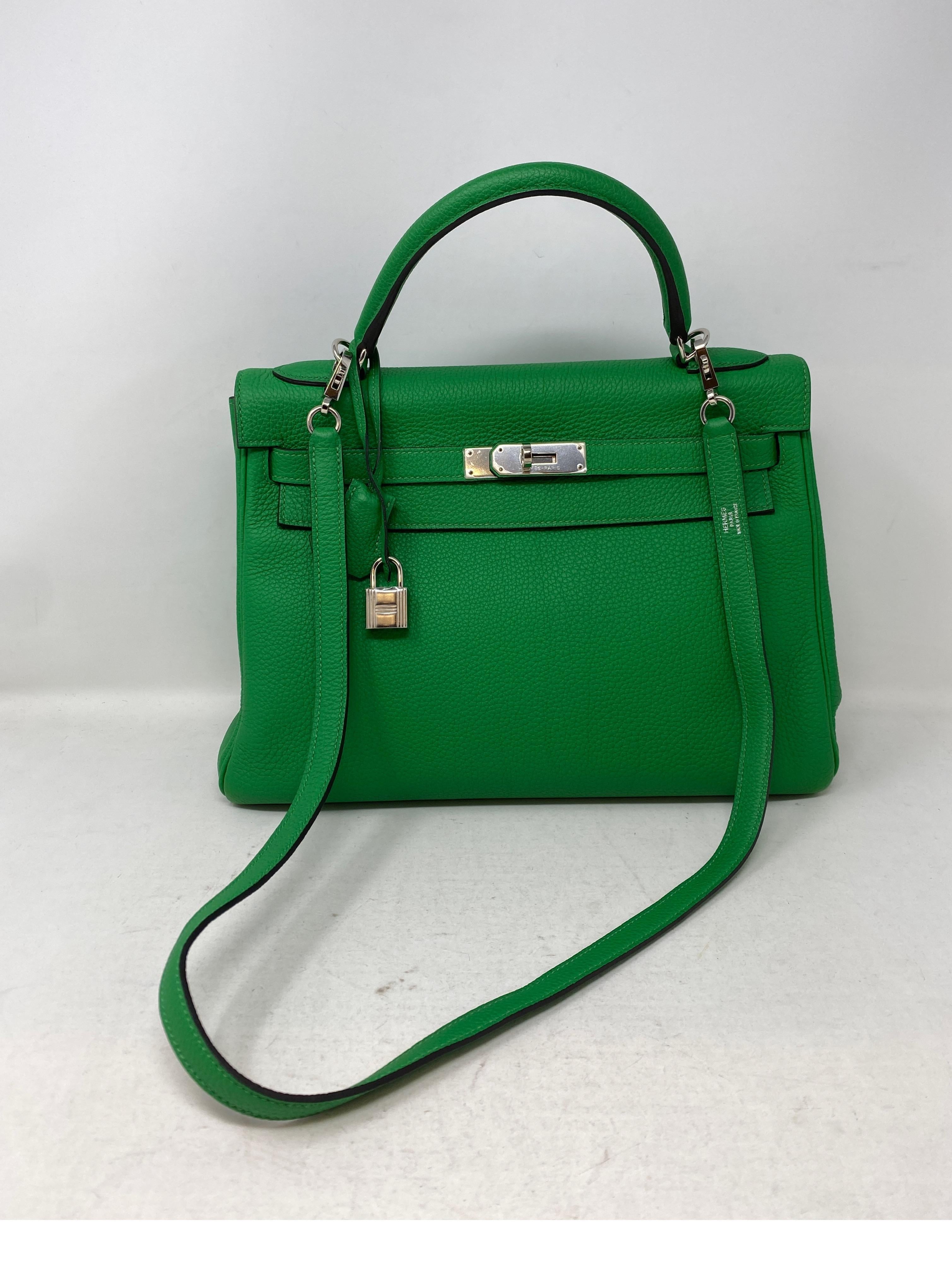 Hermes Bamboo Kelly 35 Bag. Striking green bamboo color with palladium hardware. Good condition. Includes clochette, lock, keys, and dust cover. Guaranteed authentic. 