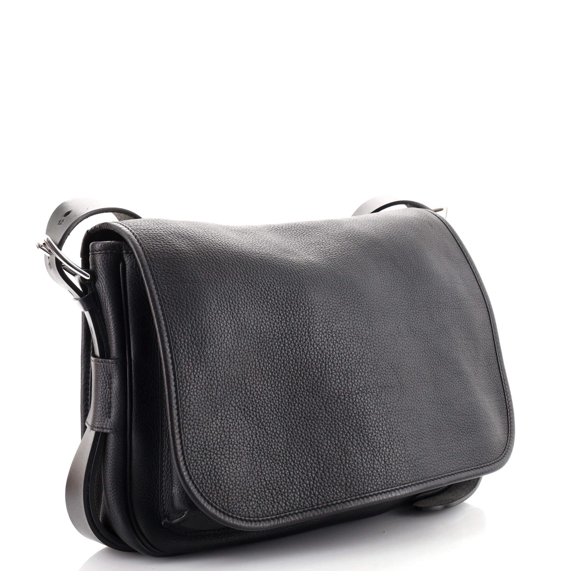 Condition: Marketplace Only. Illegible code. Odor in interior. Creasing, oil slick discoloration, wear and scuffs on exterior and underneath flap, moderate wear and scuffs on strap. Marks underneath strap, scratches on hardware.
Accessories: No
