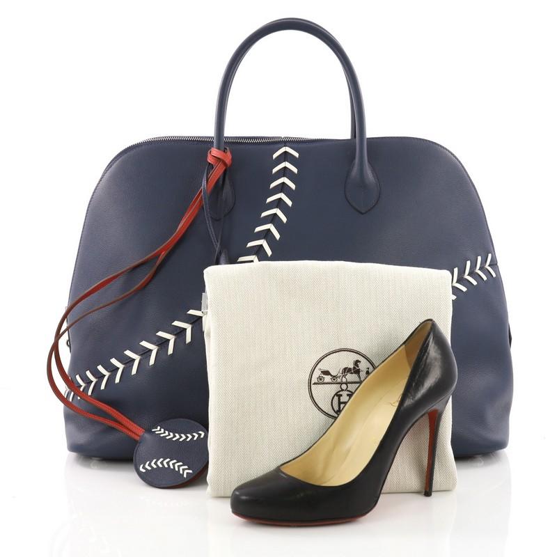 This Hermes Baseball Bolide Handbag Evercolor 45, crafted from Blue de Malte Evercolor leather, features dual rolled leather handles, white leather 