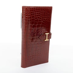 Portafoglio lungo HERMES Bearn con soffietto, in pelle Rouge H lucida a squame, con dettagli dorati