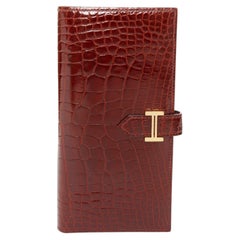 Portafoglio lungo HERMES Bearn con soffietto, in pelle Rouge H lucida a squame, con dettagli dorati