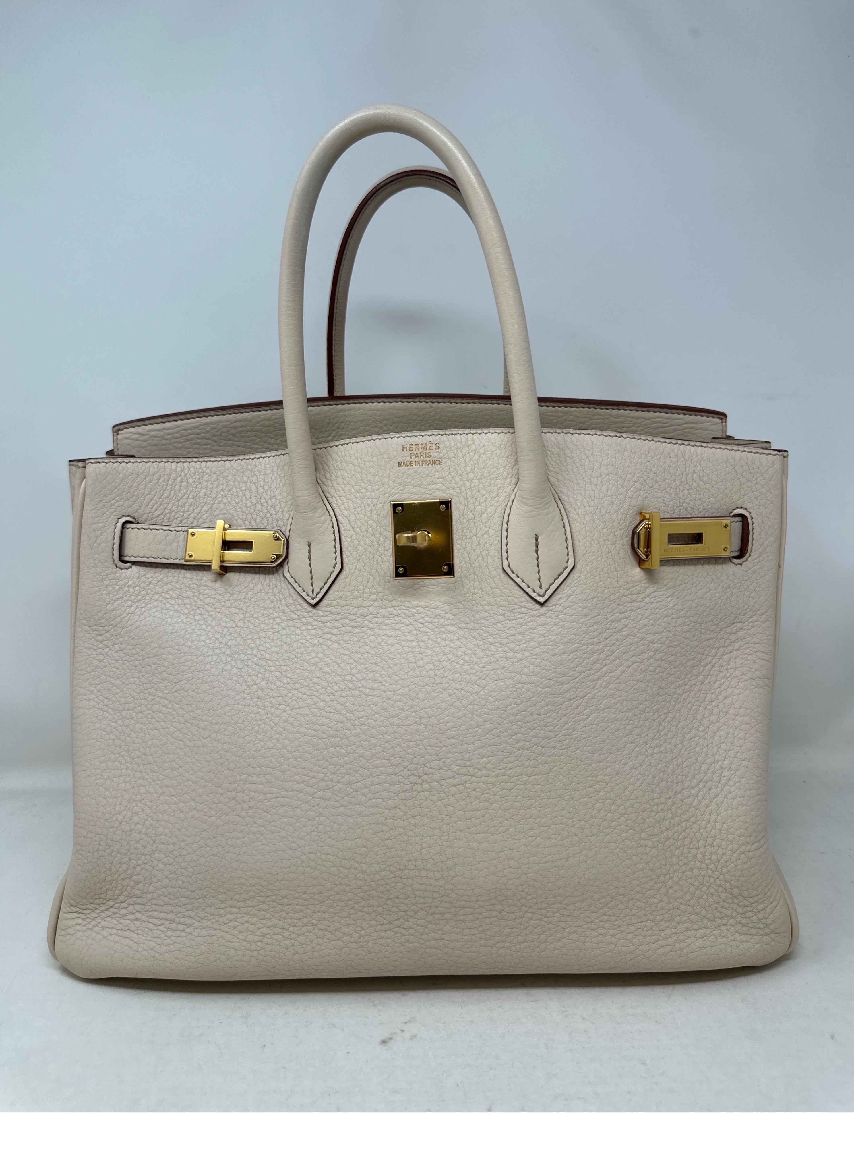 Hermes Beige Birkin 35 Bag. Gold hardware. Beige color Birkin clemence leather. Excellent condition. Interior clean. Hard to find neutral color. Includes clochette, lock, keys, and dust bag. Guaranteed authentic. 