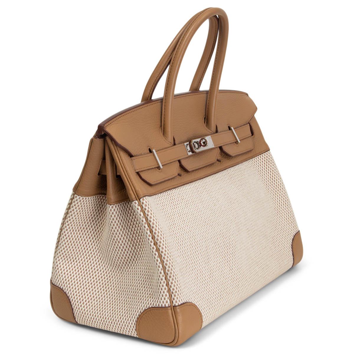 100% authentic Hermès Birkin 35 bag in Tabac-Camel Taurillon Clemence leather (soft, structured) and cashmere Toile Criss Cross (larger weave than normal Toile H). Extremely rare combination. Lined in Chevre (goat skin) with an open pocket against