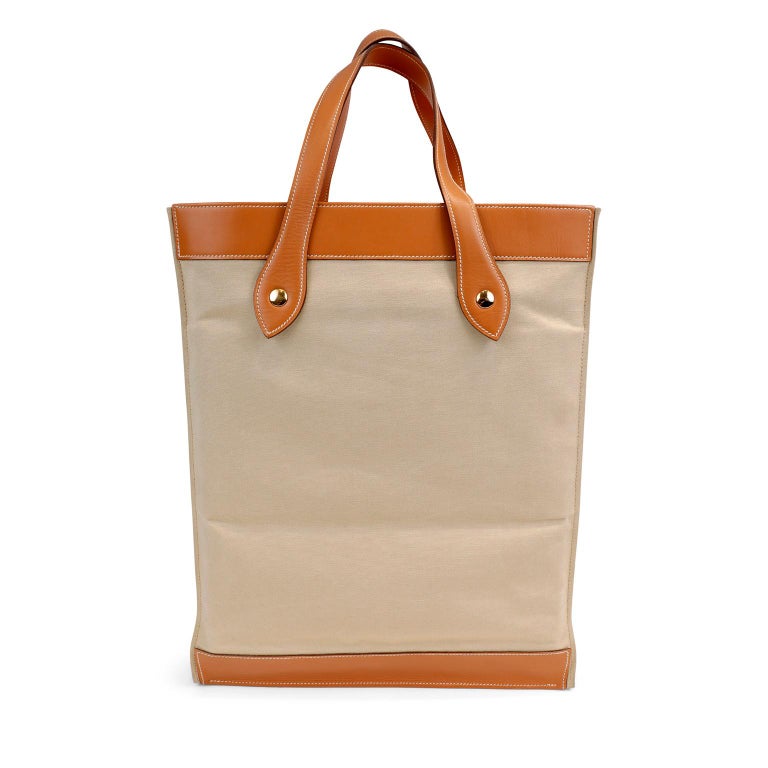 Hermès Beige Canvas and Gold Swift Leather Unisex Tote For Sale at 1stDibs