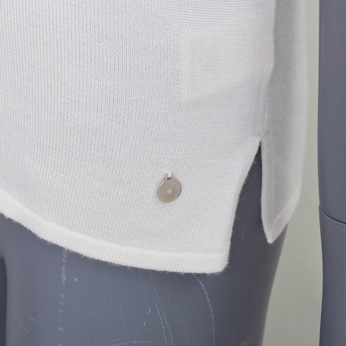 Jersey jersey de manga corta HERMES beige de cachemira de seda plateada H charm FR36 S
Referencia: SNKO/A00559
Marca: Hermes
Material: Cachemira, Seda
Color: crema
Patrón: Sólido
Cierre: Pullover
Detalles adicionales: Colgante de plata H en el