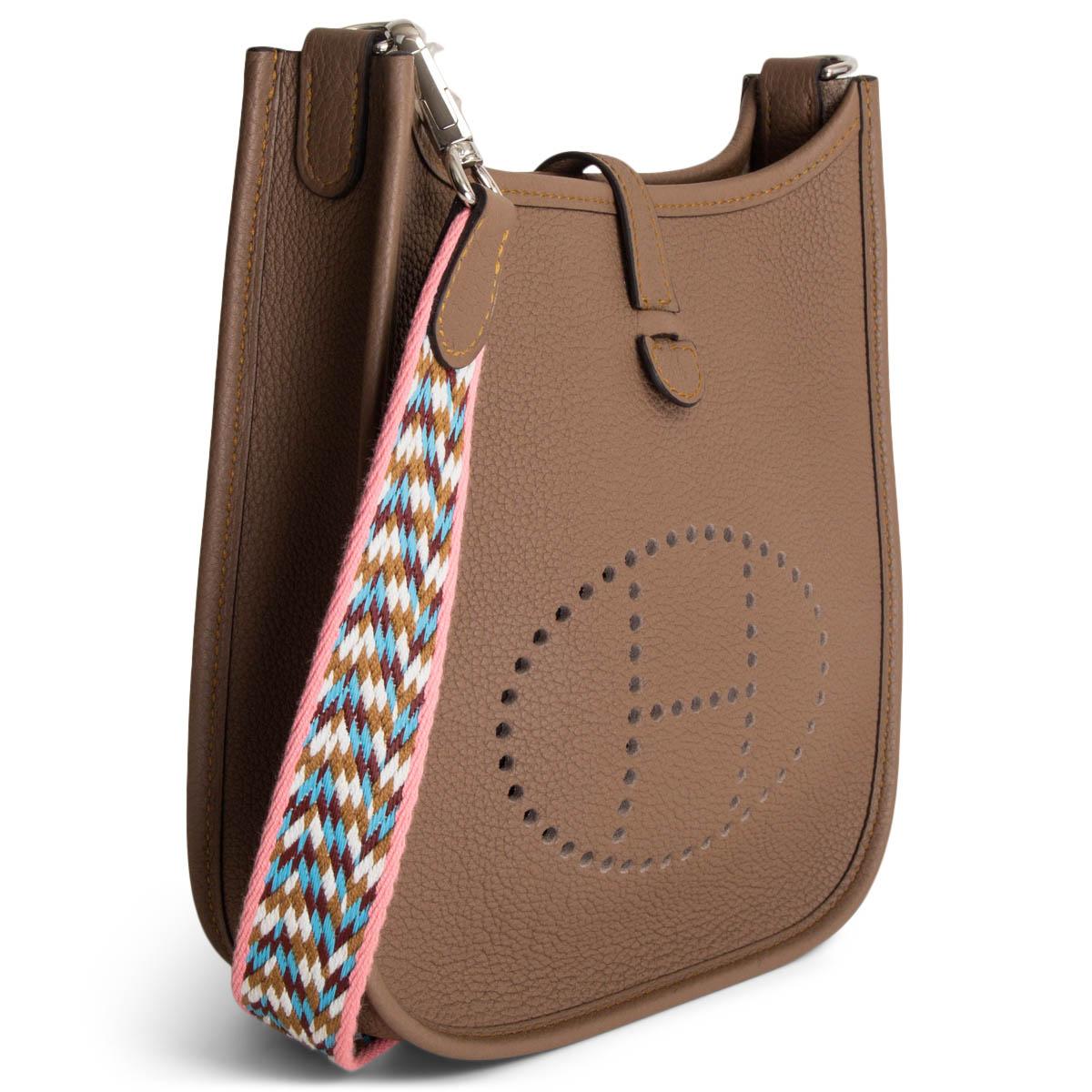 100% authentic Hermès Evelyne 16 Amazone crossbody bag in Beige Weimar Taurillon Maurice leather with wooly sangle zigzag shoulder strap in rose ete, Bleu du Nord, Rouge H, beige and blanc canvas. Perforated leather 