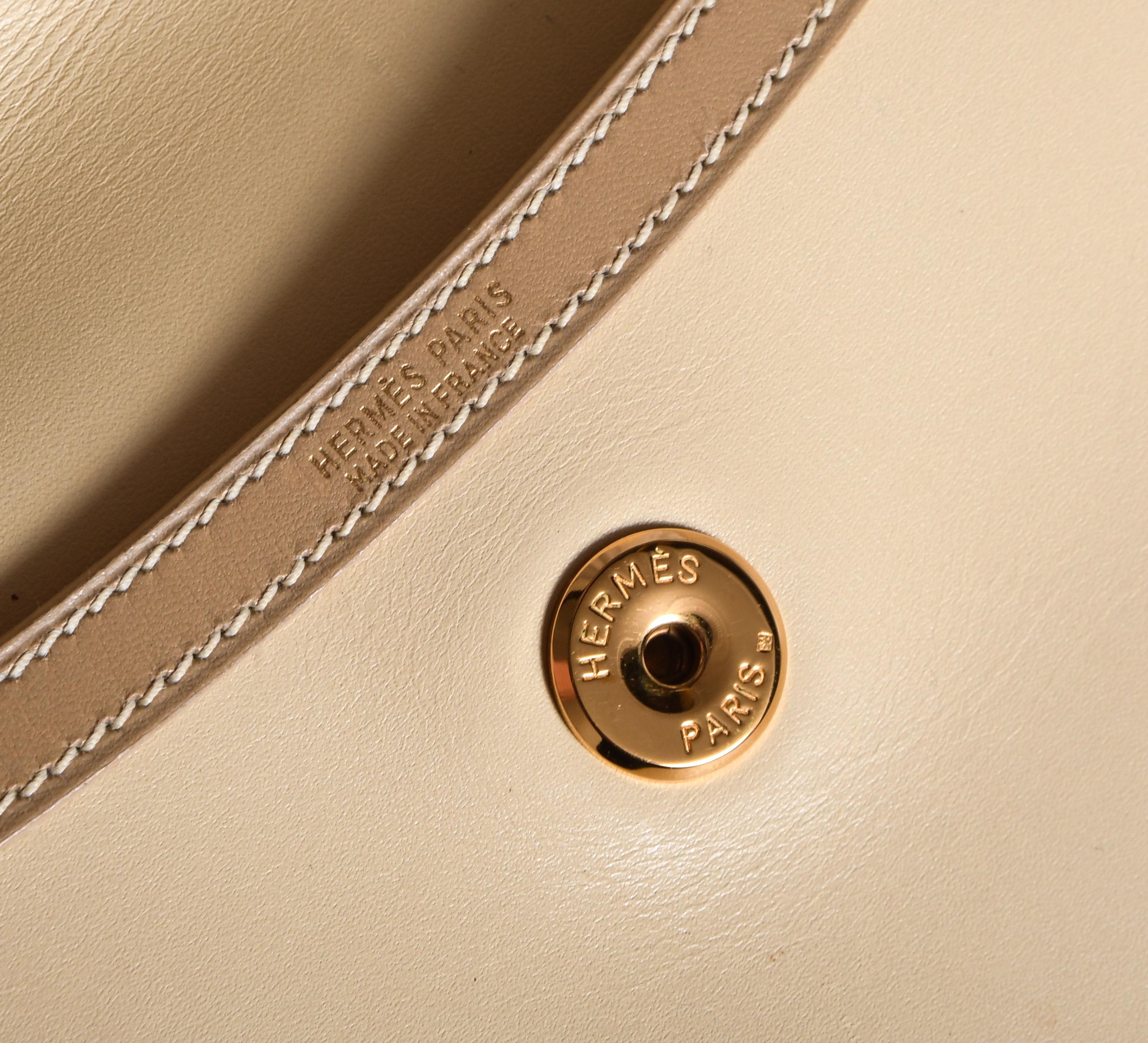 beige leather clutch