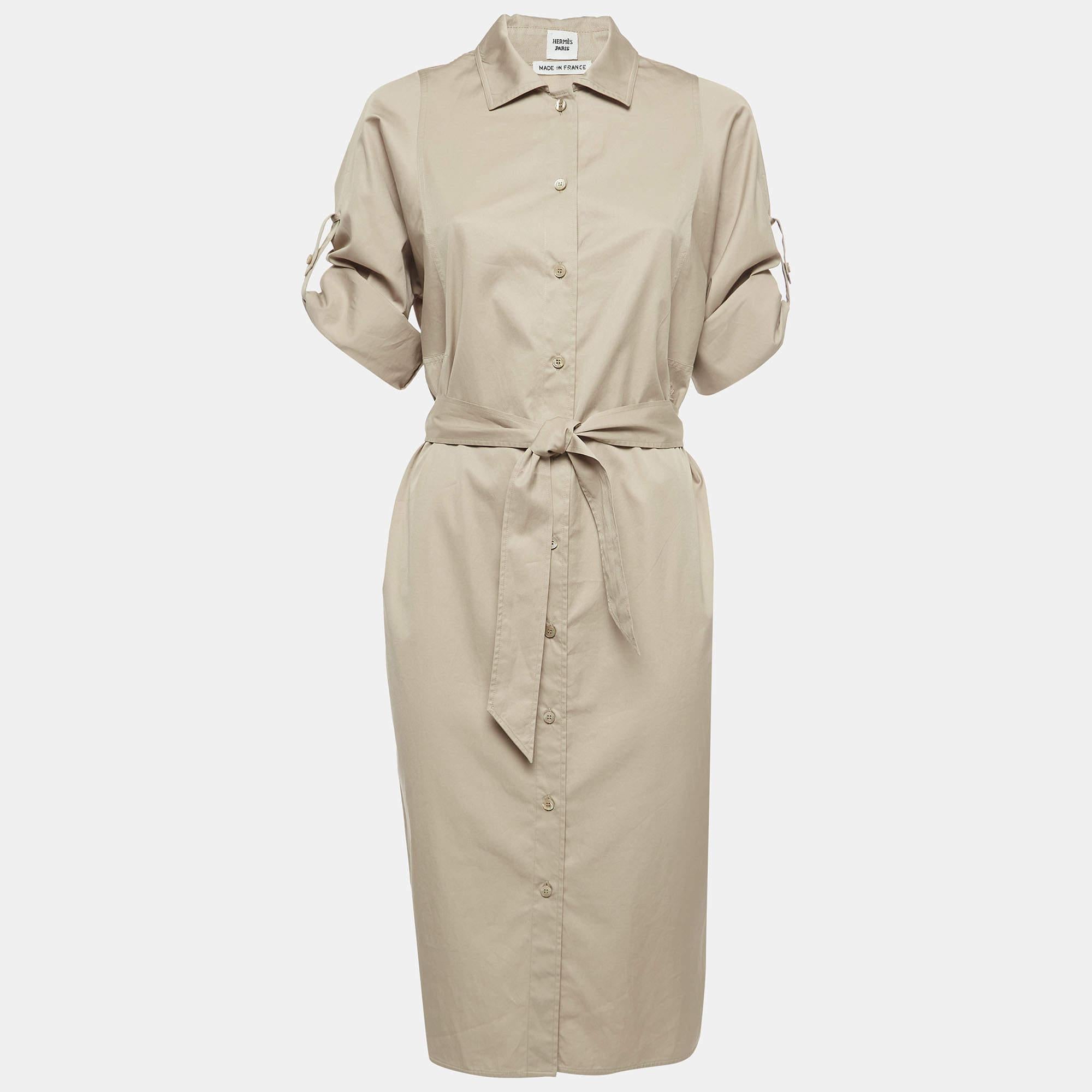 Indulge in effortless sophistication with the Hermèsdress. Crafted with exquisite detail, this dress boasts timeless elegance. Featuring subtle logo embroidery, a flattering belted waist, and a midi length, it effortlessly merges style and comfort