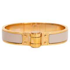 Hermes - Bracelet à charnière en or beige rosé