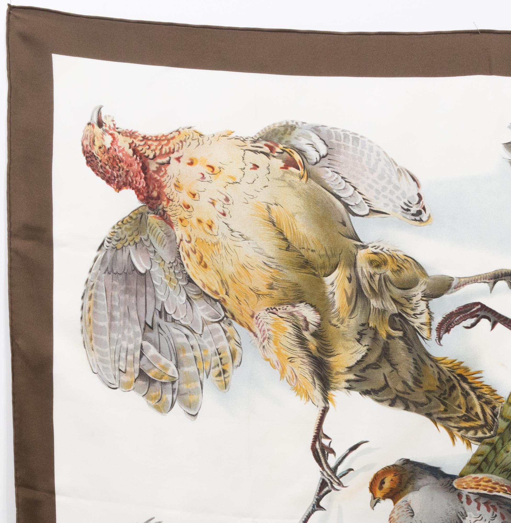 Hermès silk scarf Belle Chasse by M de Linares featuring a brown border, a Hermès signature. 
First edition: 1958
In good vintage condition. Made in France.
35,4in. (90cm)  X 35,4in. (90cm)
We guarantee you will receive this  iconic item as