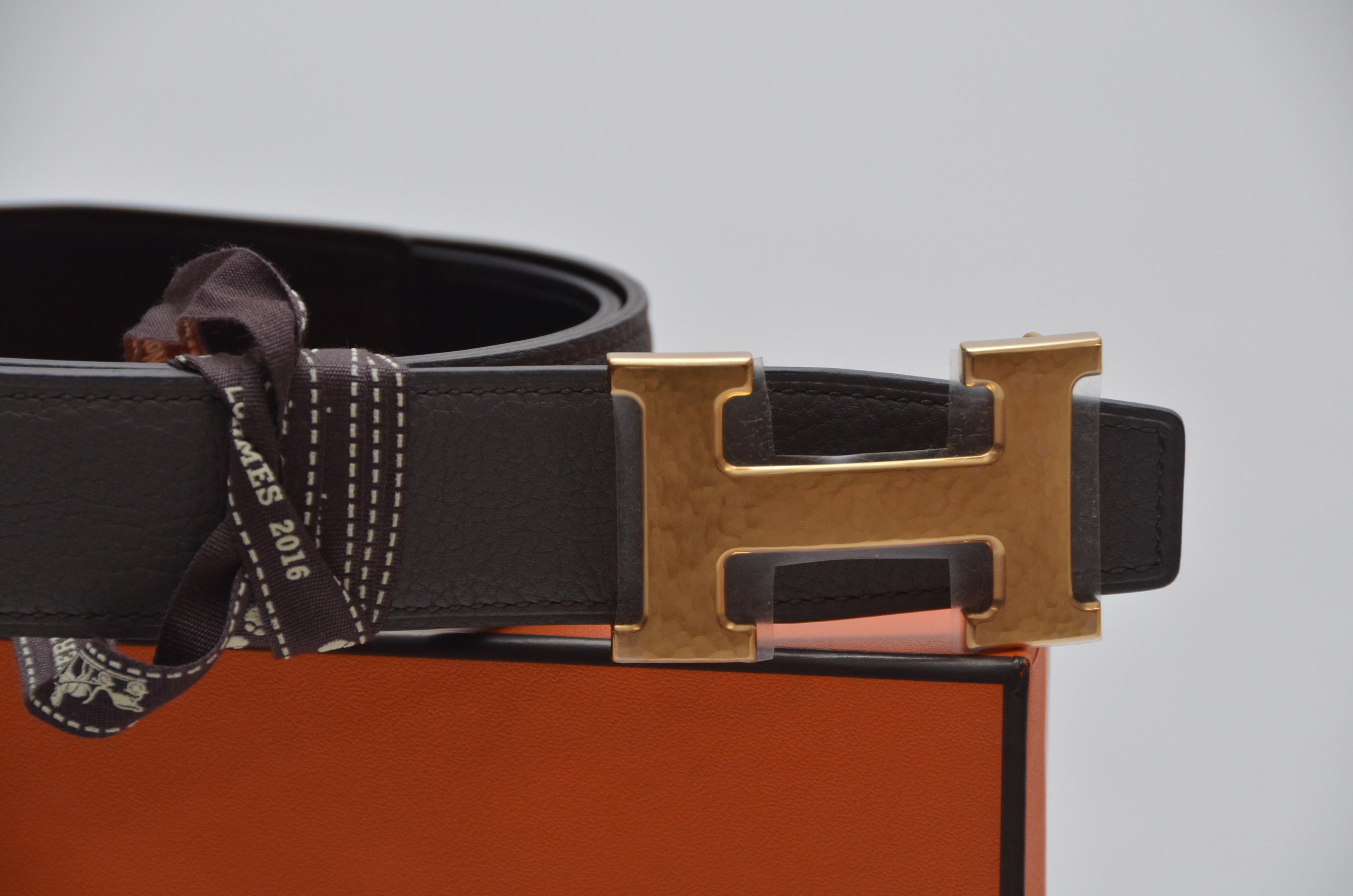 100% authentic guaranteed 
Hermes Belt 
32MM Veau Togo Leather  
Noir/Chocolat 
Buckle Guilloched 
NEW With Box