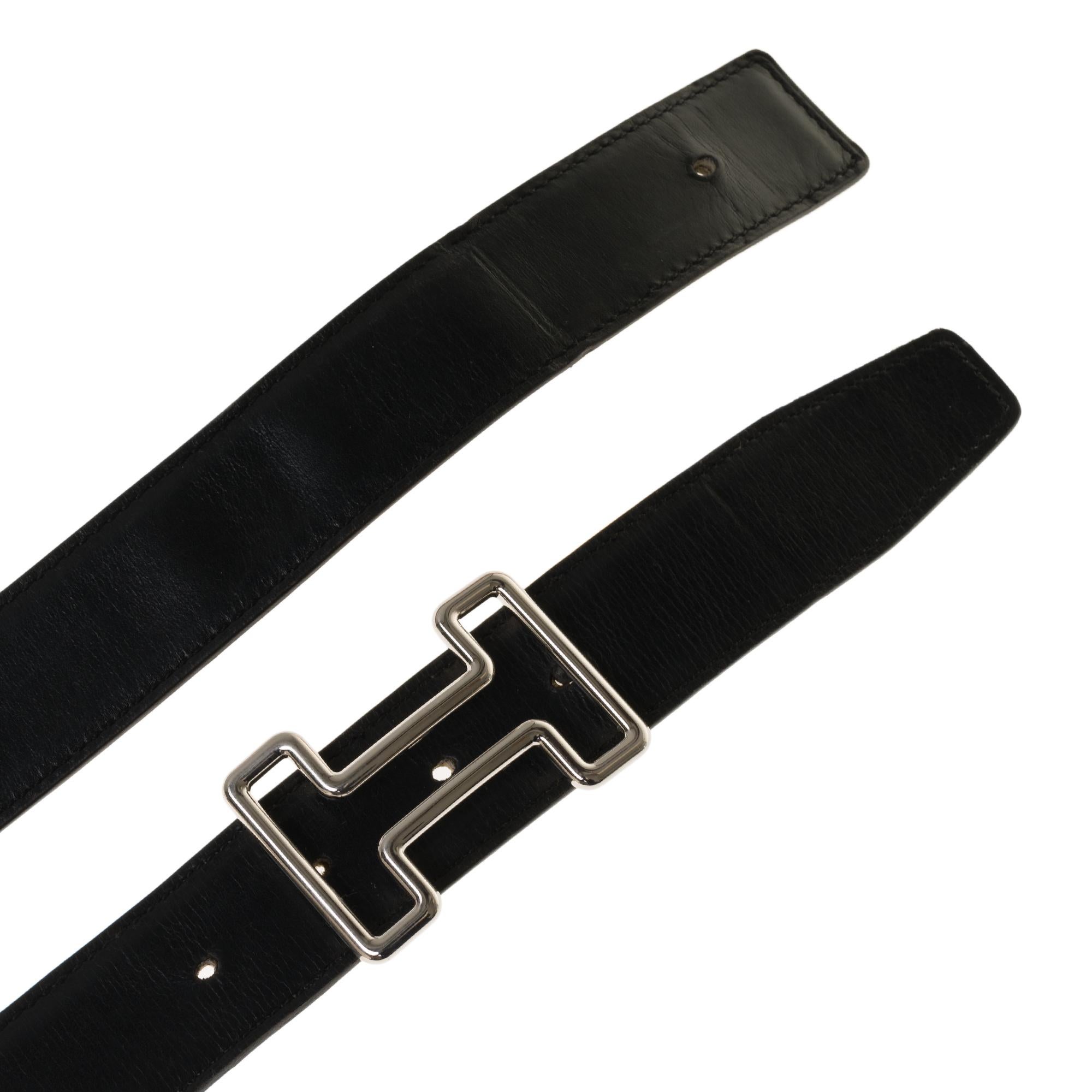 Beautiful Hermès Reverse belt in black leather box & Courchevel gold, 
Tonight palladium-plated metal buckle (Brand new)
Size: 85 cm
Signature: Hermès Paris, Made in France

Dimensions: 3.2 cm * 85 cm
Good vintage condition with wear marks on the