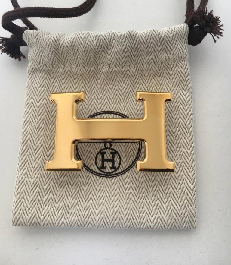 Hermès belt Buckle // Model "Constance" in shiny gold, new ! at 1stDibs