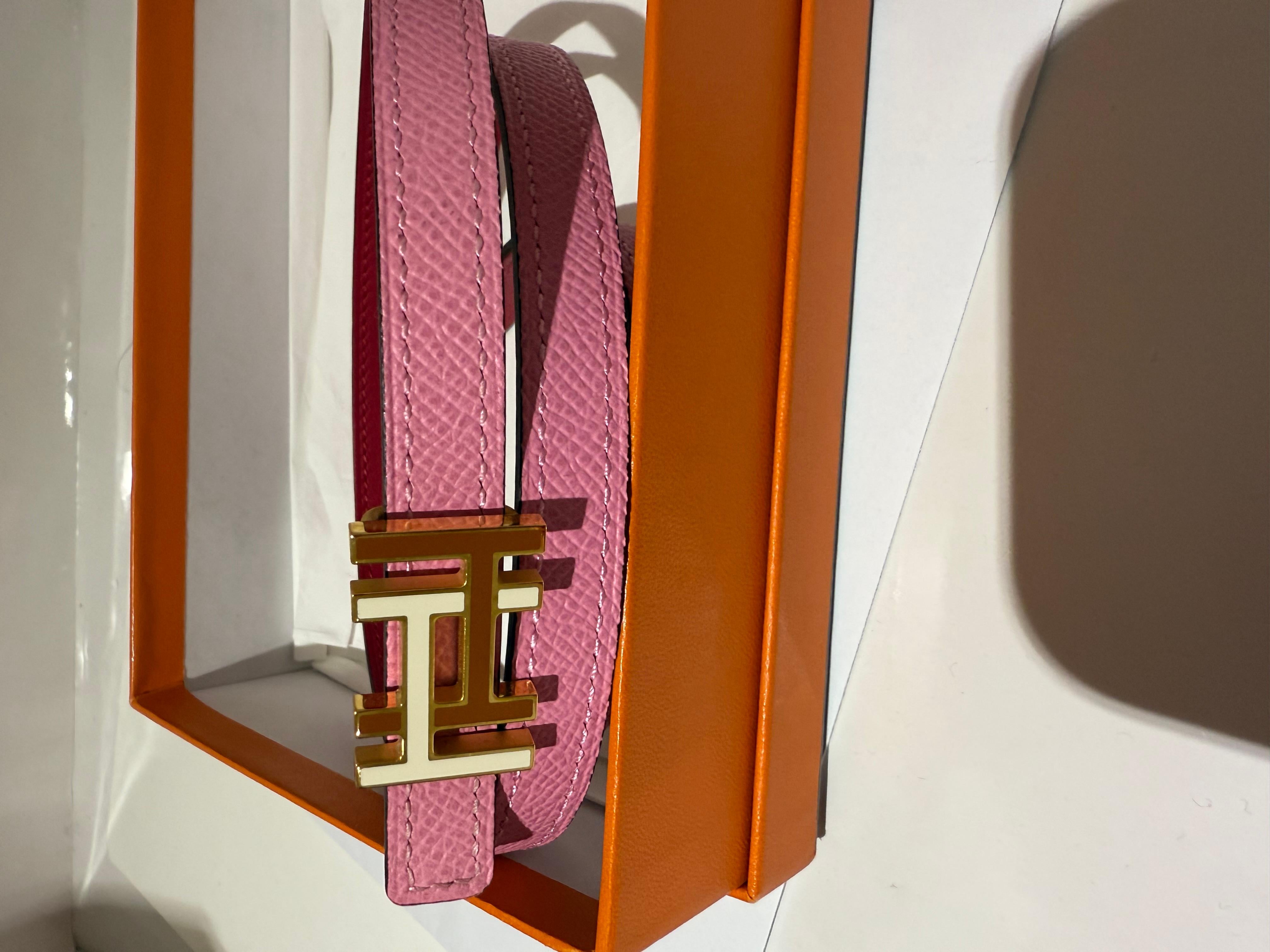 Hermes thin belt double sided, in pink confetti color and red, with double H buckle in white and burgundy colour. Belt buckle in metal & Reversible leather strap in Swift and Epsom calfskin.

Made in France
Metallic finish: Rose gold plated
Width: