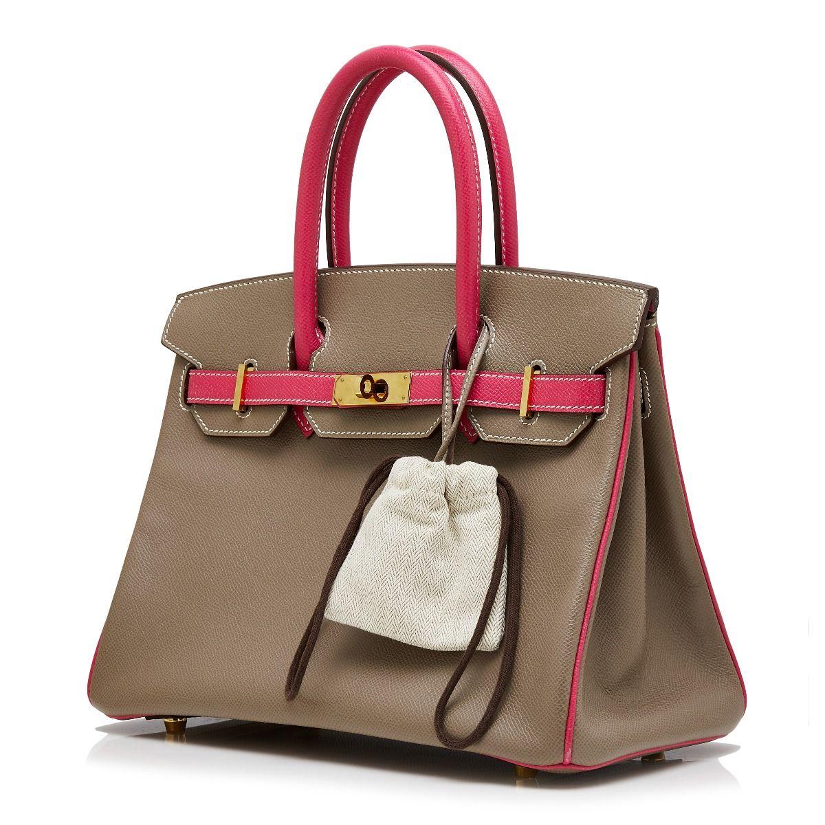 Adding a twist to the traditional Hermès Birkin, this Bi-colour HSS bag was specially made to order and showcases a neutral grey epsom leather exterior, which is offset by contrasting vivid pink top-handles, piping and belt arms and accented by