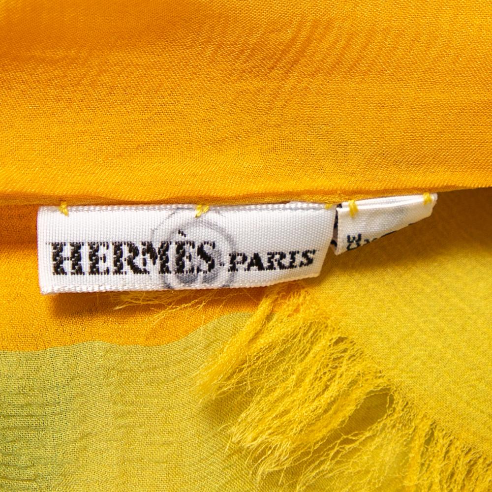 Presented by the House of Hermes, this scarf is a beautiful accessory that will make you look polished and stylish! It is made from bicolored striped and layered silk chiffon fabric. This scarf has a length of 180 cm. Add this Hermes creation to