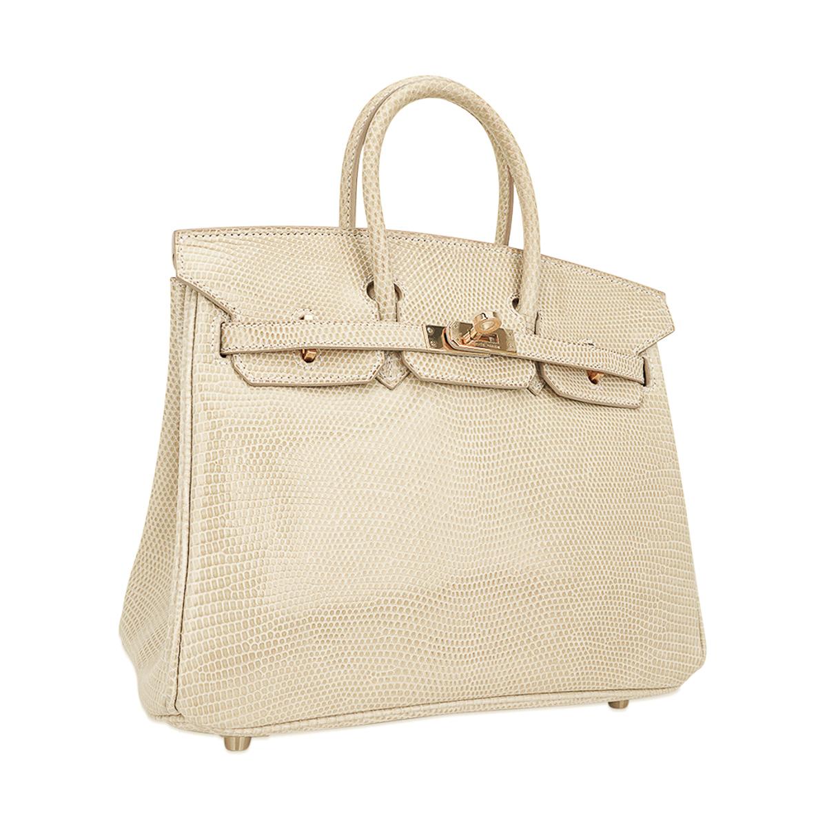 Mightychic offers a limited edition Hermes Birkin 25 bag featured in Blanc Casse lizard.
Exquisite pale buttery cream with lush Gold hardware.
The most sublime colour, this rare beauty is a collectors treasure!
Elegant and understated.
Comes with