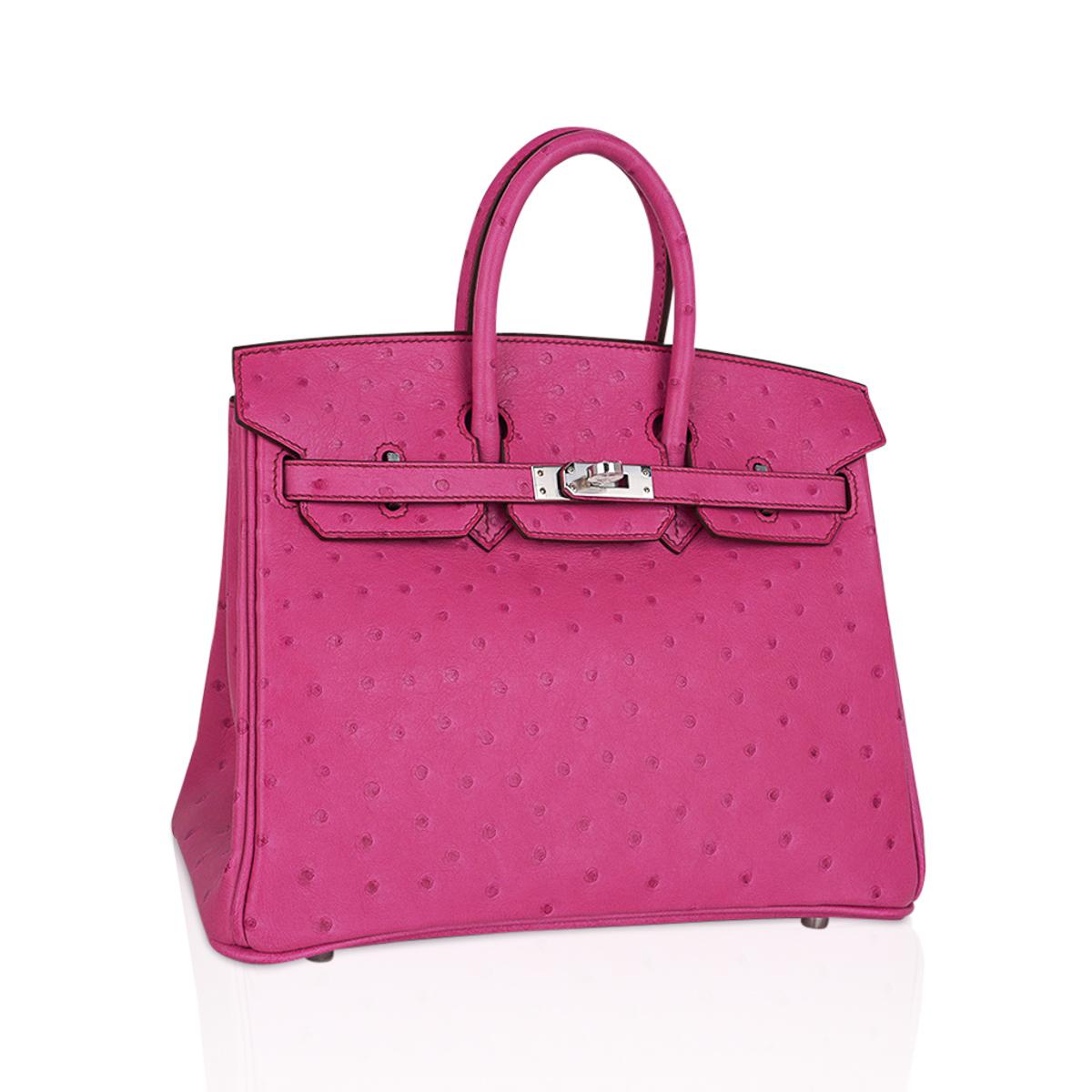 Mightychic offers an Hermes Birkin 25 bag featured in rare Fuchsia pink Ostrich.
Rarely produced colour this exquisite beauty is a must have for any Hermes aficionado.
This Hermes Birkin bag is accentuated with Palladium  hardware, and is nothing