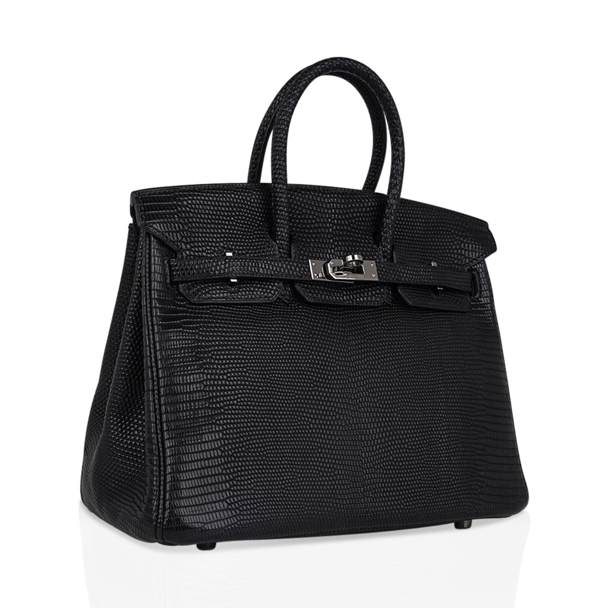 Mightychic offers an Hermes Birkin 25 bag featured in Matte Black Varanus Salvator Lizard.
This extremely rare Hermes Birkin bag is elegant, timeless and absolutely stunning.
Accentuated with Palladium hardware.
Very faint marks on the hardware -