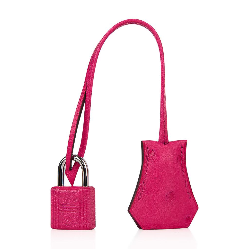 Guaranteed authentic Hermes Birkin 25 bag featured in vibrant Rose Tyrien Ostrich.
This vibrant jewel toned color is divine with a myriad of selections from any wardrobe.
Accentuated with palladium hardware.
NEW or NEVER WORN  
Comes with the lock