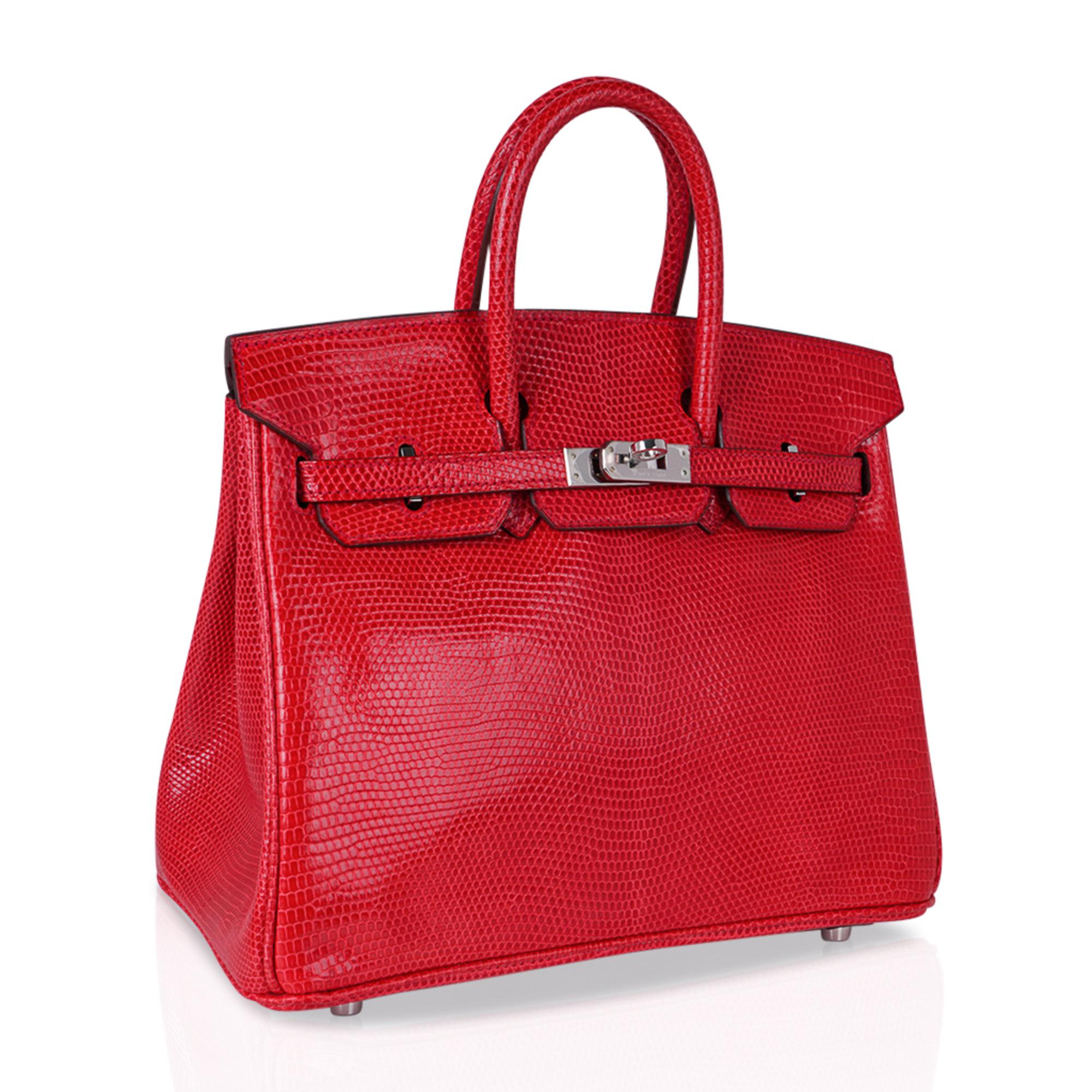 Mightychic offers an Hermes Birkin 25 bag Rouge Exotic in rare coveted Lizard.
A gorgeous strawberry red that is neutral and perfect for year round wear.
A glorious pop of colour to add to a myriad of your wardrobe ensembles.
Fresh with palladium