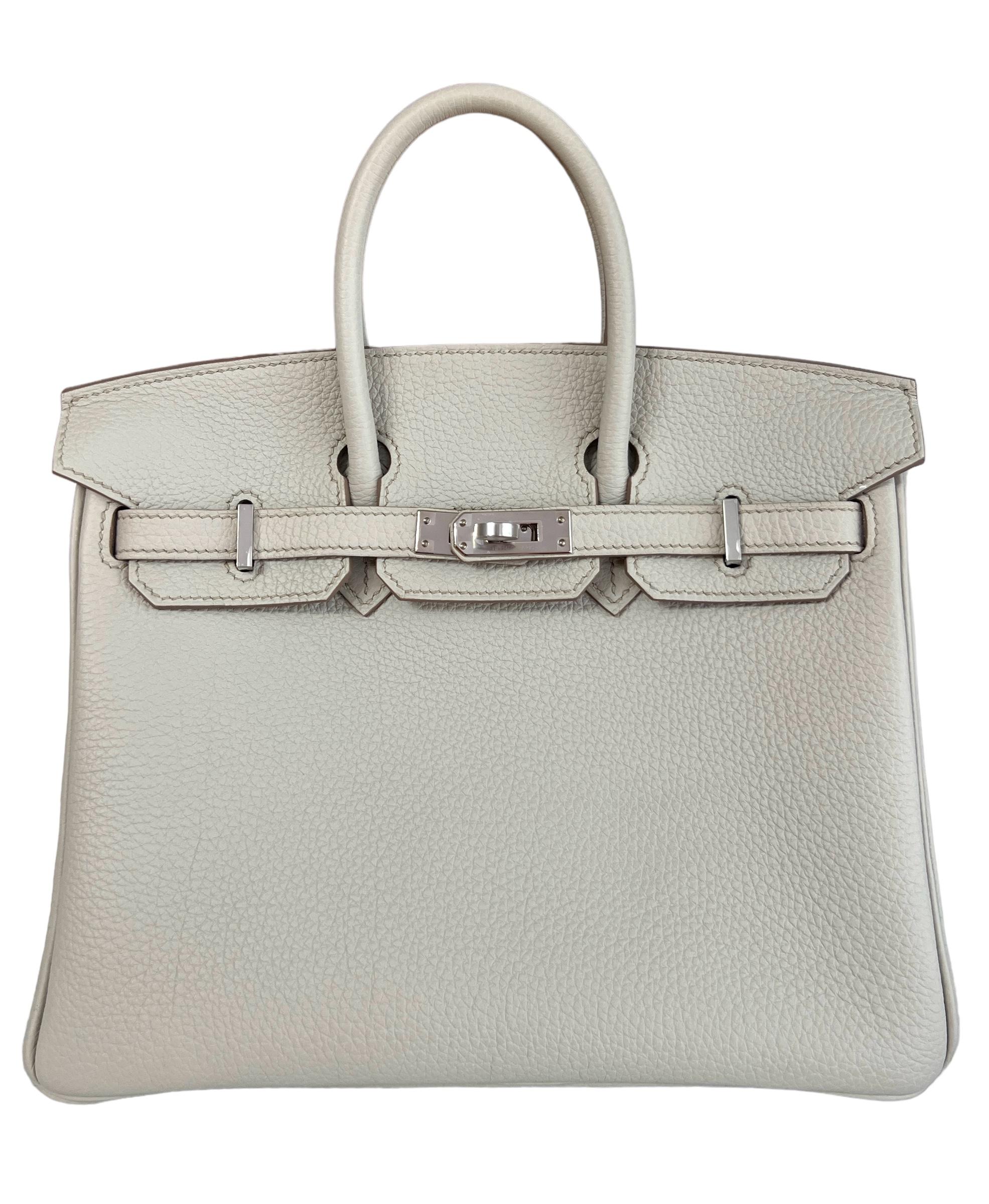 Absolutely Stunning and One The Most Coveted and Difficult to get Hermes Combos! As New Hermes Birkin 25 Beton Togo Leather complimented by Palladium Hardware. As New Plastic on all Hardware and Feet. U Stamp 2022. 

Shop with Confidence from Lux