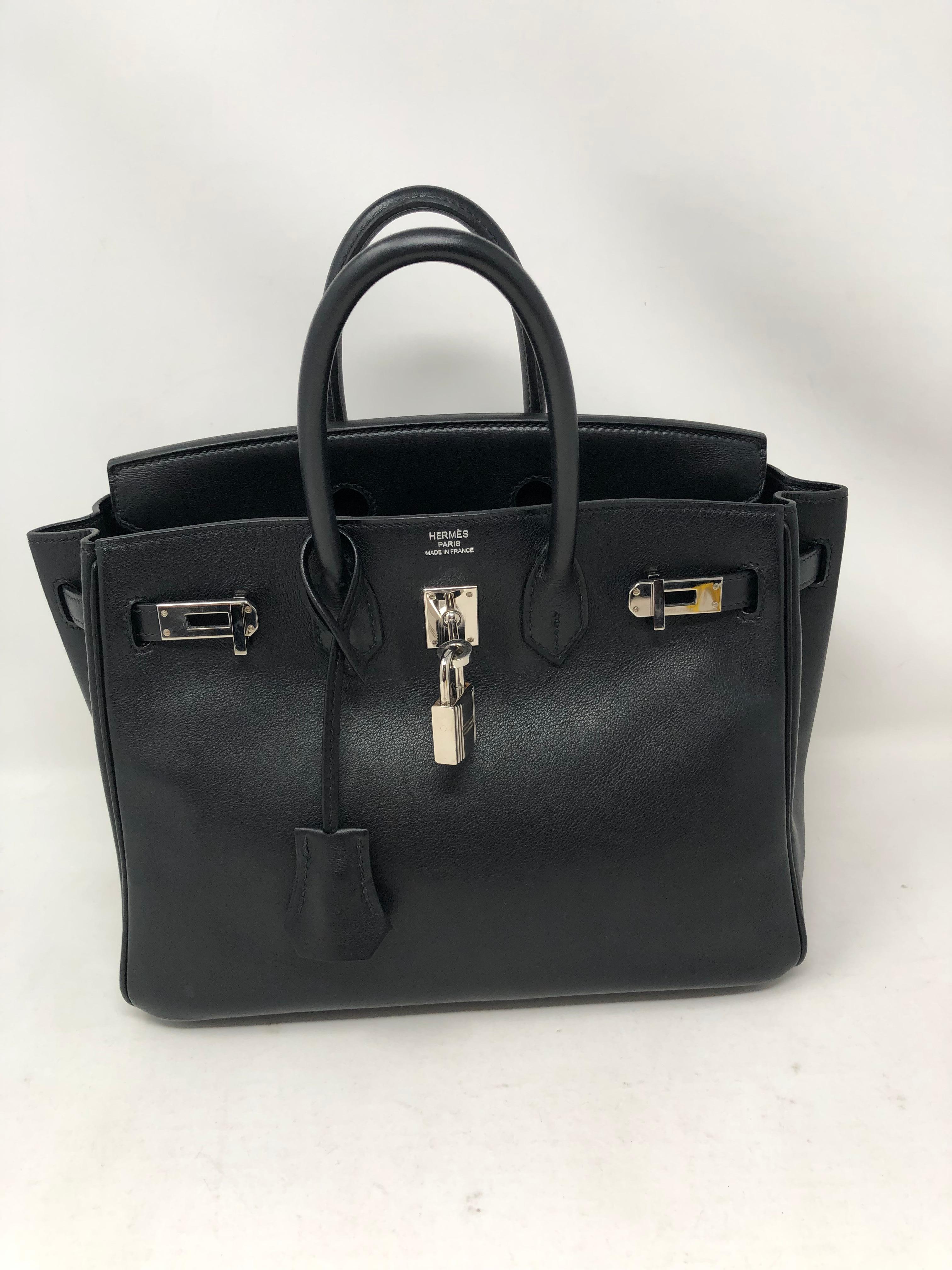 Hermes Birkin 25 Black Swift Leather Bag. Beautiful smooth black leather with palladium hardware. Excellent condition. Just received a spa treatment at Hermes. Looks new. The most wanted bag. Collector's piece. Iconic and rare unicorn bag.