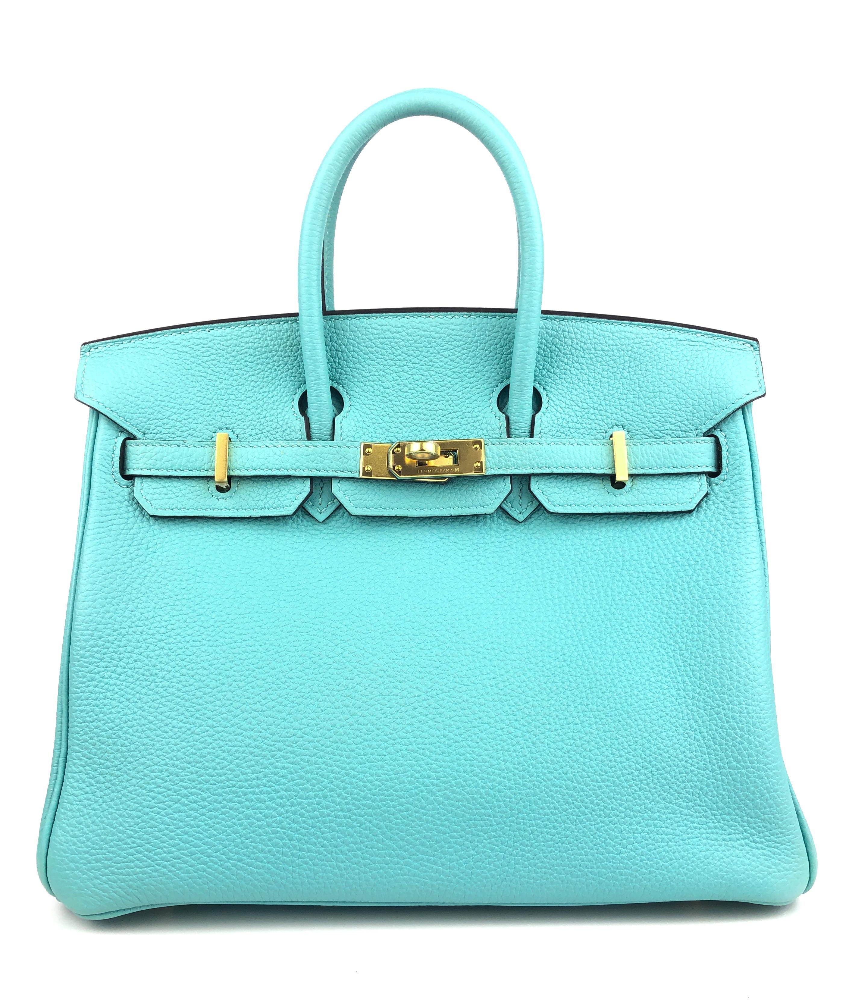 Very Rare As New Hermes Birkin 25 Blue Atoll Tiffany Blue Togo Leather Gold Hardware. As New Condition with All Plastic on Hardware and Feet, perfect corners and structure. 2015 T Stamp.

Shop With Confidence from Lux Addicts. Authenticity