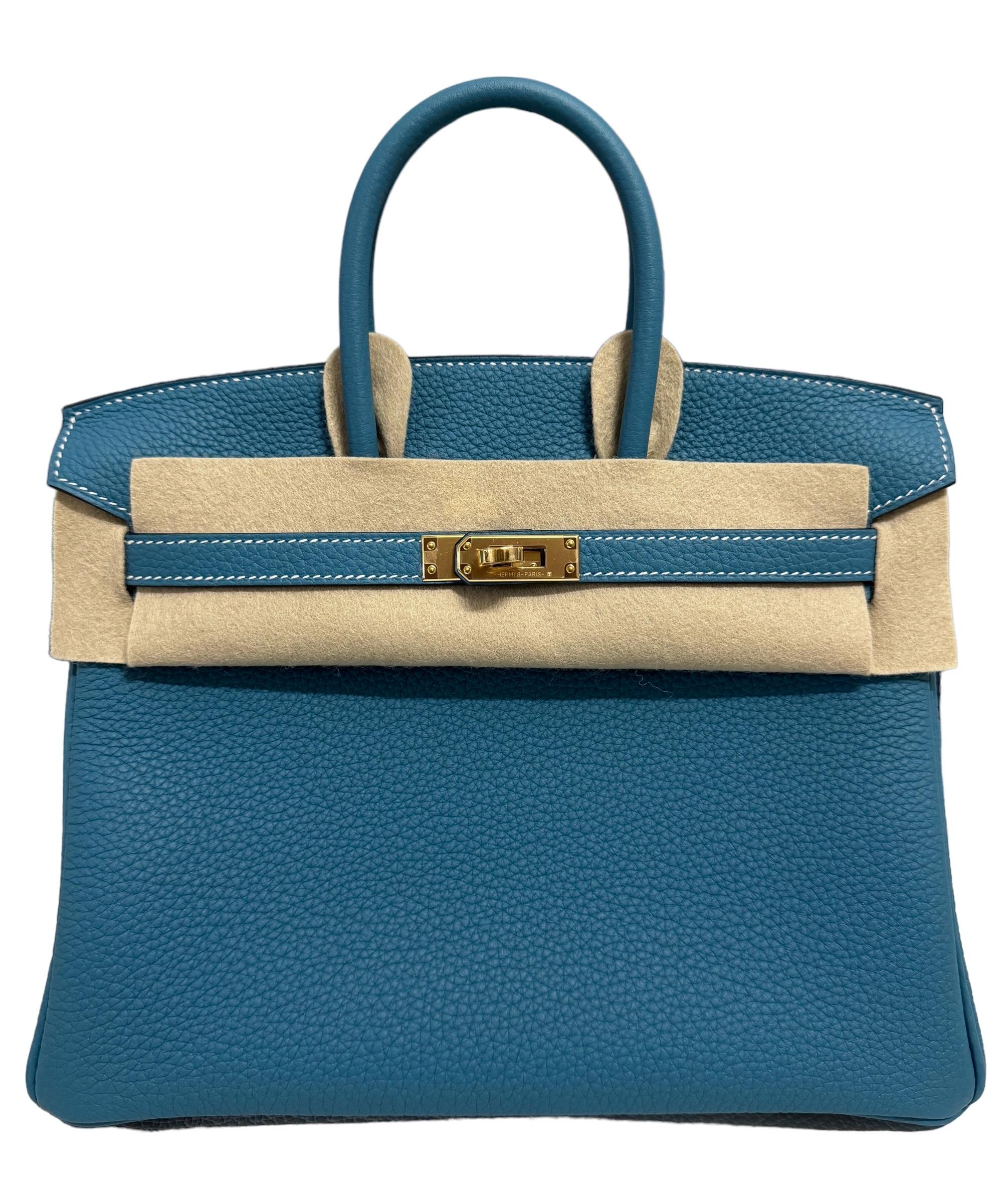 Absolutely Stunning and One The Most Coveted and Difficult to get Hermes Combos! Just Reintroduced New 2024 Hermes Birkin 25 Blue Jean Togo Leather complimented by Gold Hardware. W Stamp 2024. Includes all Accessories and Box.

Shop With Confidence
