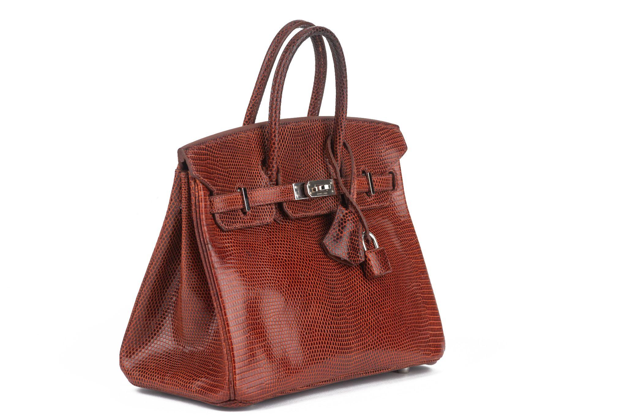 Hermès Birkin 25 in brique lizard leather with palladium hardware, having contrast stitching, front flap, two straps with center toggle closure, tirette, clochette with lock and two keys, and double rolled handles (drop 3
