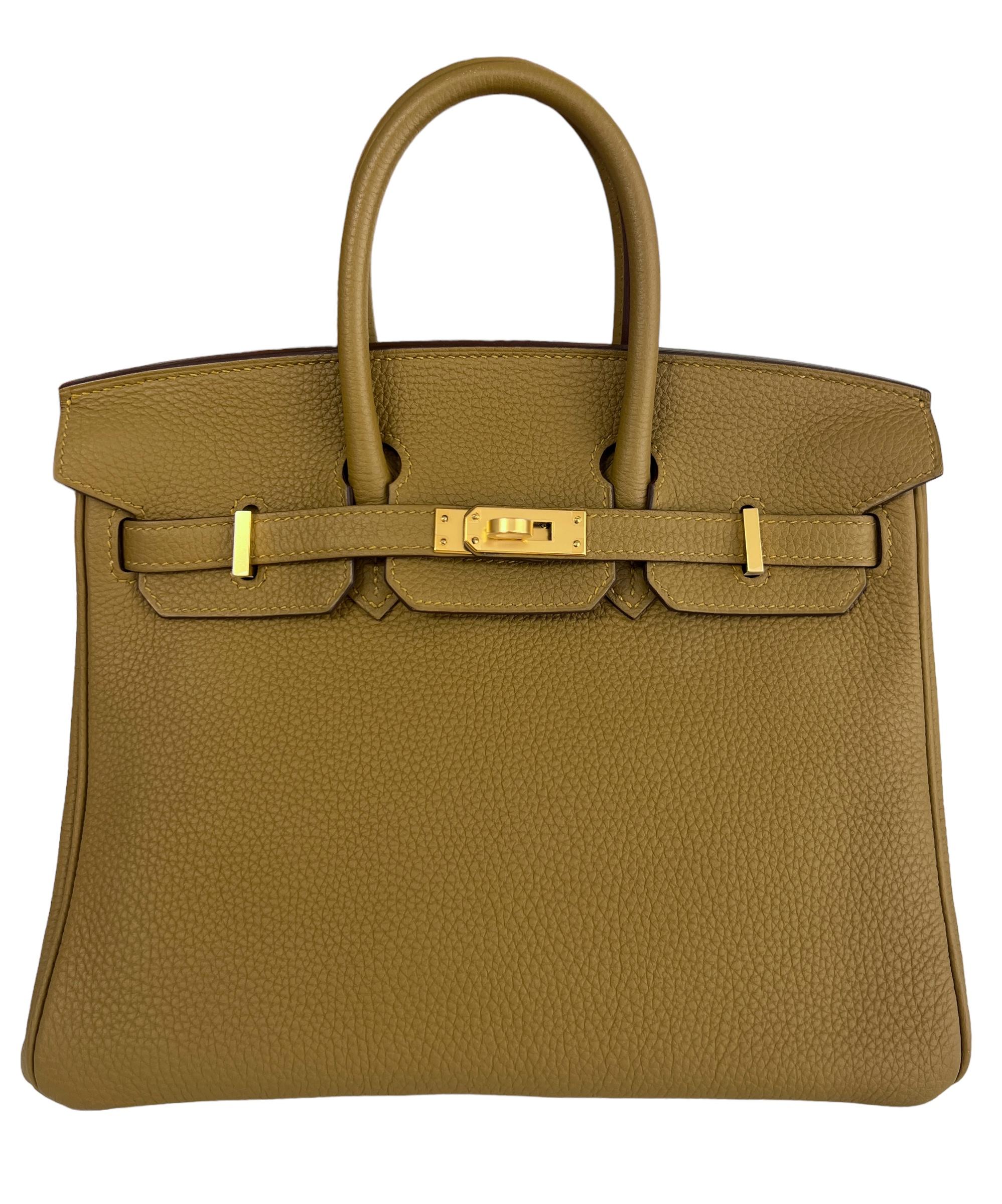 Absolutely Stunning and One The Most Coveted and Difficult to get Hermes Combos! As New Hermes Birkin 25 Bronze Dore Togo Leather complimented by Gold Hardware. As New Plastic on all Hardware and Feet. Y Stamp 2020. 

Please Note, the bag has minor