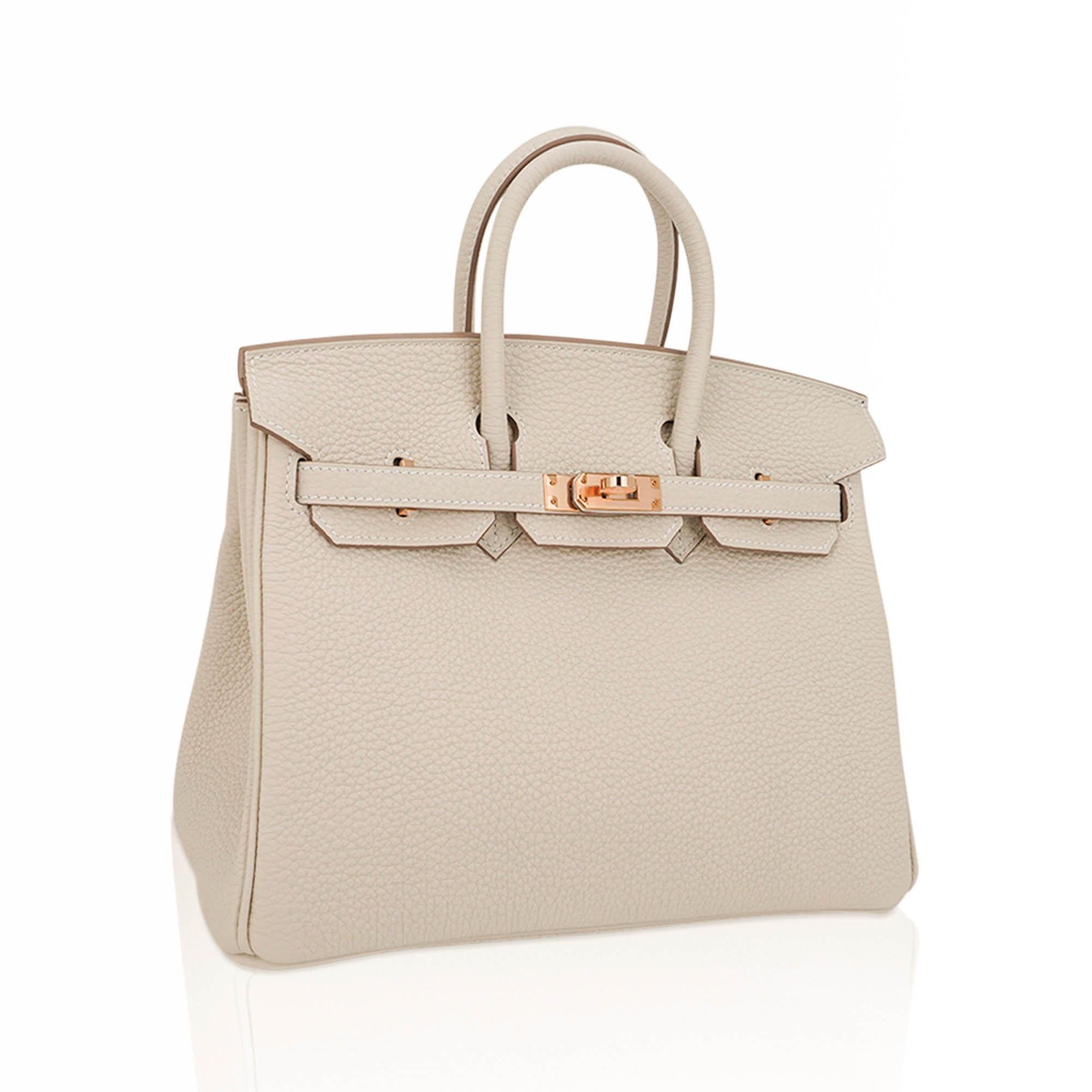Mightychic offers an Hermes Birkin 25 bag featured in Craie.
This subtle neutral colour is perfect for year round wear.
Accentuated with coveted Rose Gold hardware.
Comes with the lock and keys in the clochette, signature Hermes box, sleeper and