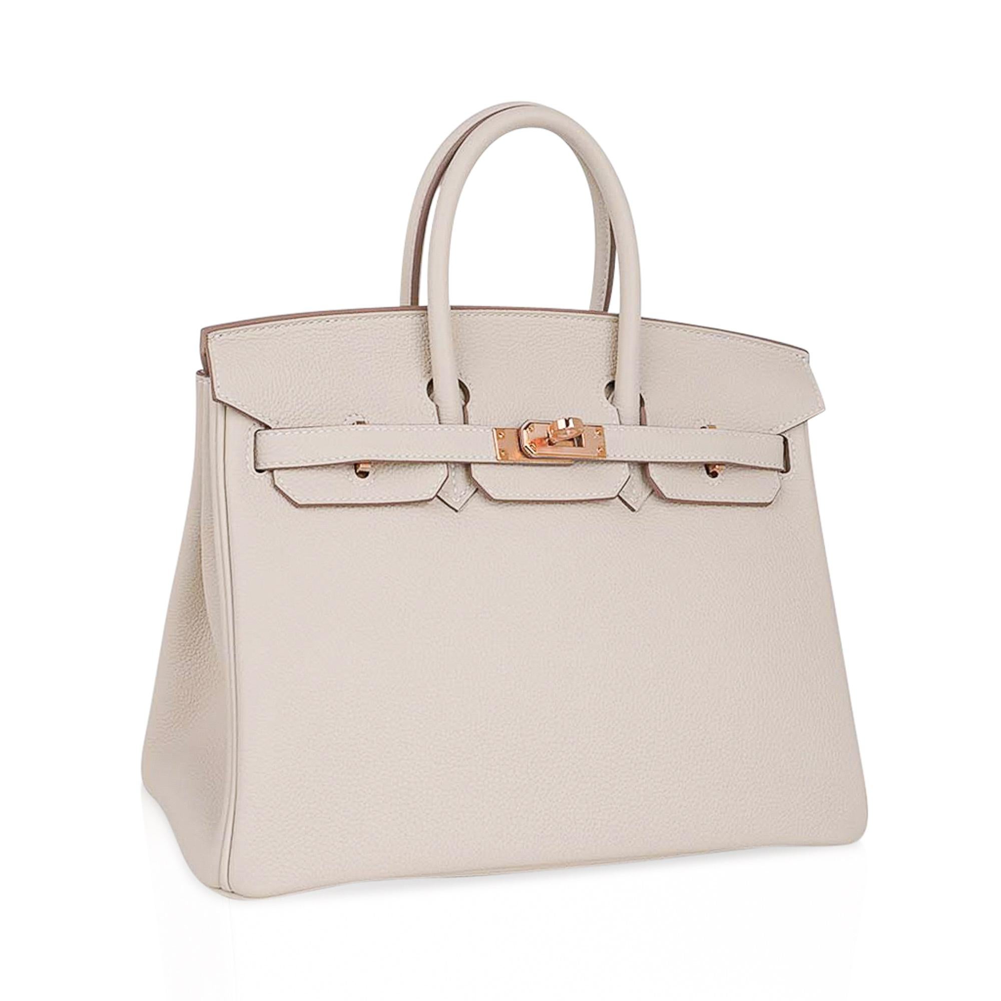 Mightychic offers an Hermes Birkin 25 bag featured in Craie.
This subtle neutral colour is perfect for year round wear.
Accentuated with coveted Rose Gold hardware.
Comes with the lock and keys in the clochette, signature Hermes box, sleeper and