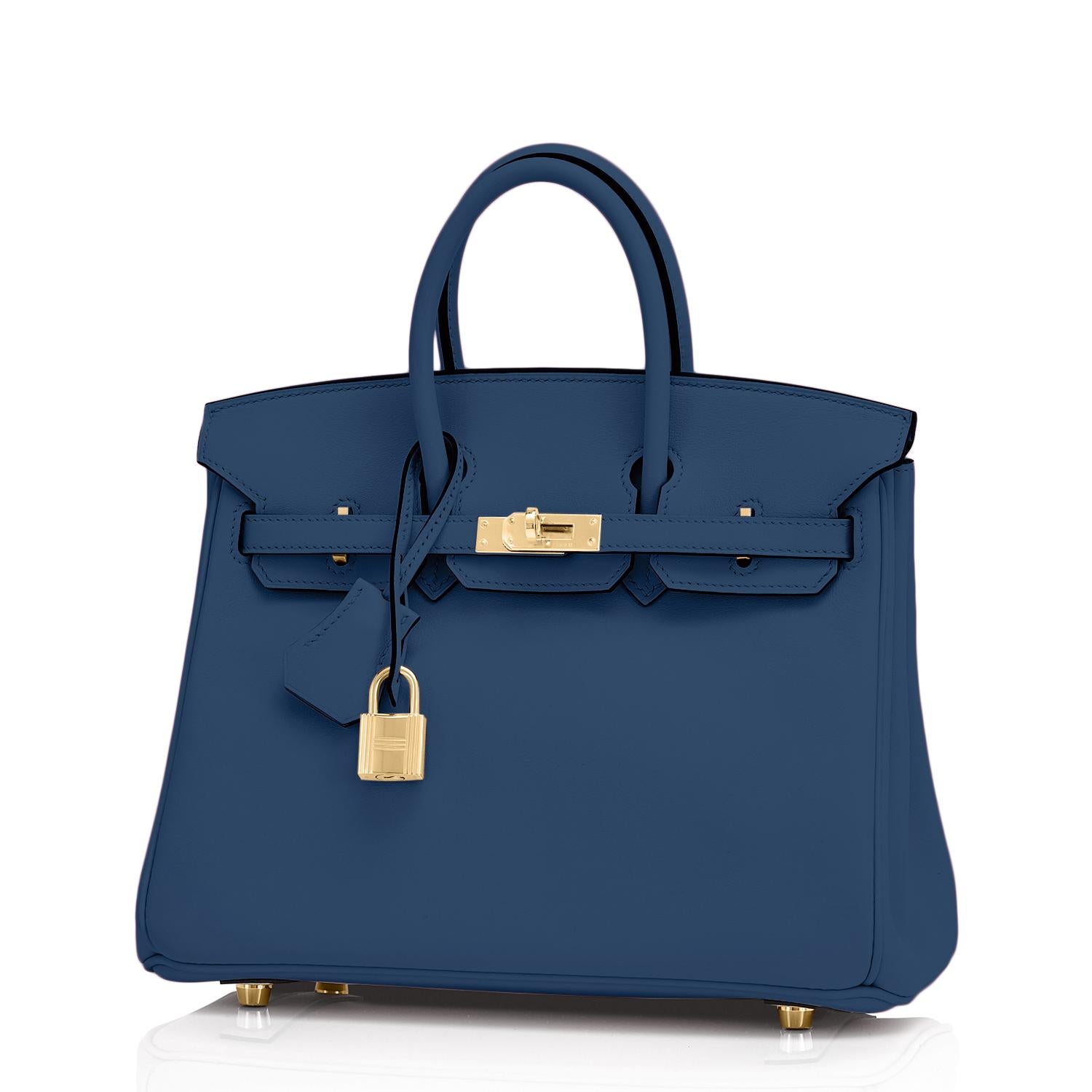 Hermes Birkin 25 Deep Blue Jewel Toned Navy Bag Gold Hardware Y Stamp, 2020
Sublime jewel-tone Deep Blue is gorgeous and perfectly on point for the top color trend of the new year.
Brand New in Box. Store Fresh. Pristine Condition (with plastic on