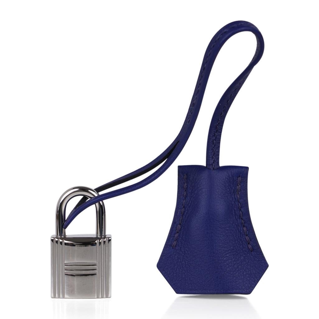 Guaranteed authentic Hermes Birkin Bleu Saphir (Blue Sapphire)
Like wearing a magnificent sapphire stone with fresh Palladium hardware.
Lush swift leather.
Comes with lock, keys, clochette, sleepers, raincoat and signature Hermes box.
NEW or NEVER