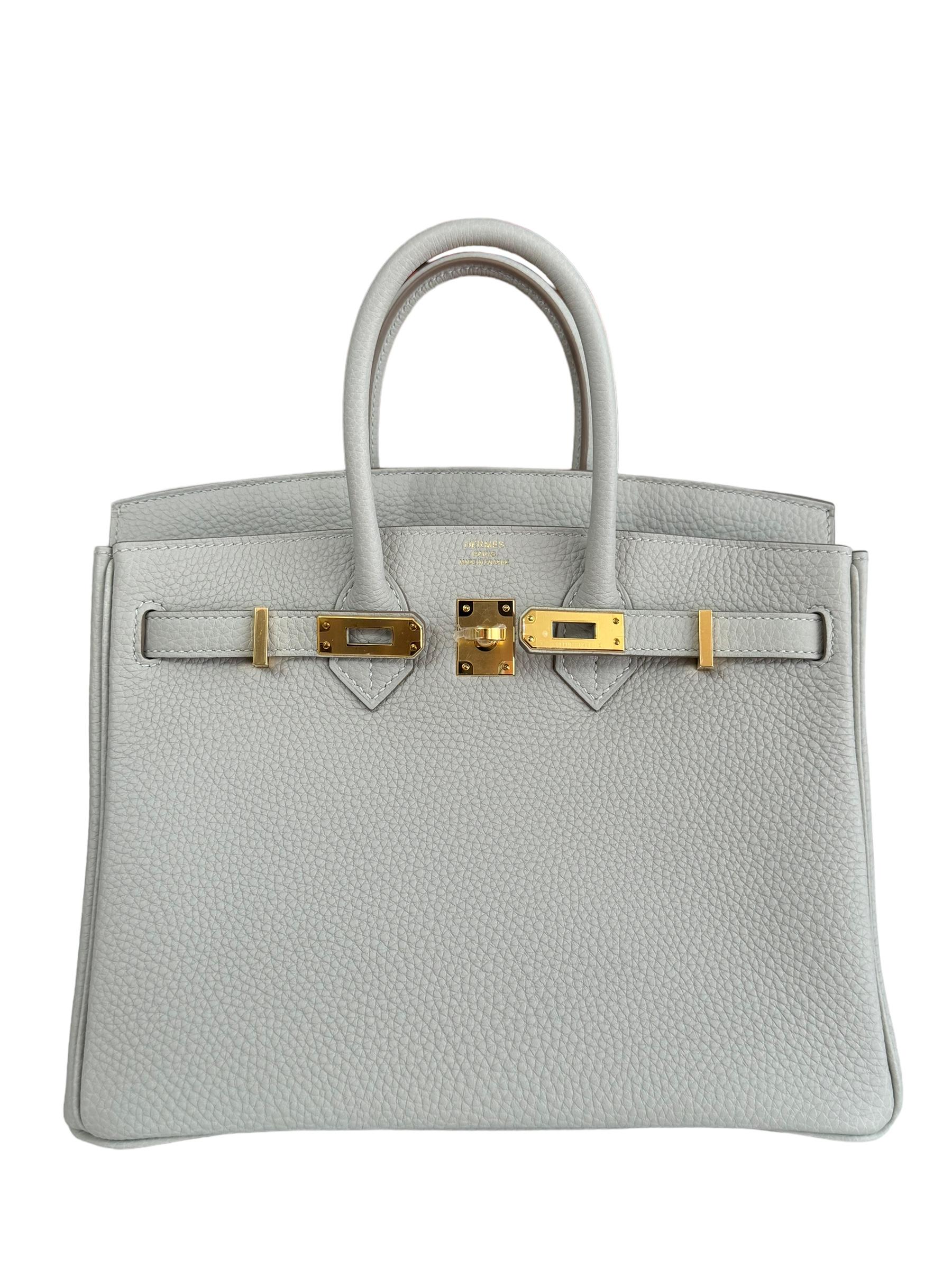 Absolutely Stunning and One The Most Coveted and Difficult to get Hermes Combos! New 2022 Hermes Birkin 25 Gris Perle Togo Leather complimented by Gold Hardware. U Stamp 2022. Includes all accessories and Box.

Shop with Confidence from Lux Addicts.